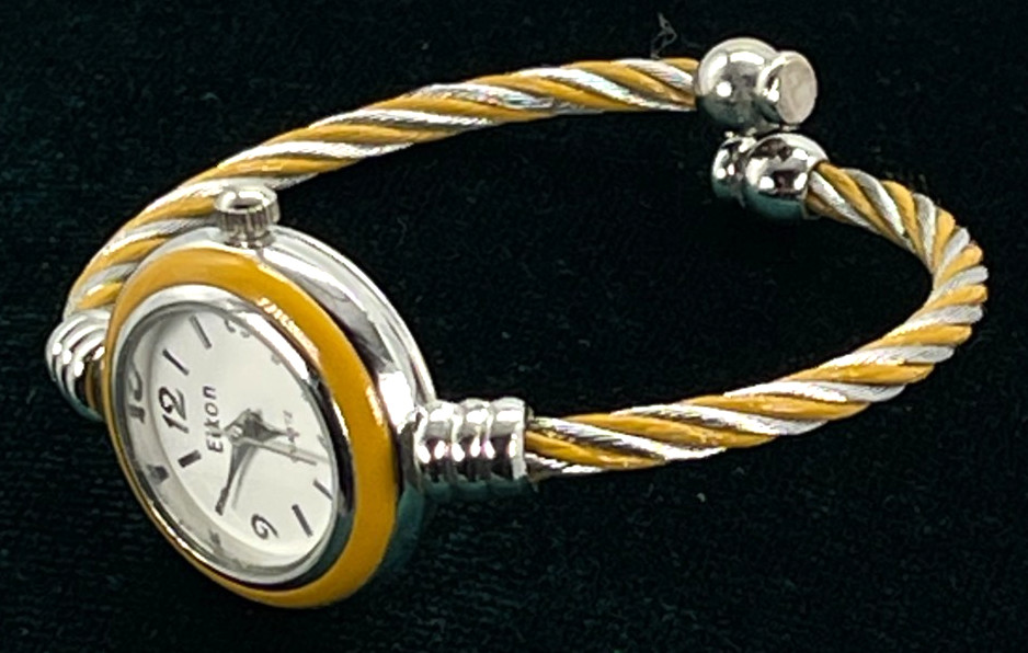 Watch Eikon Quartz White Face, Silver Numbers, 7′ Gold/Steel Twist Bracelet