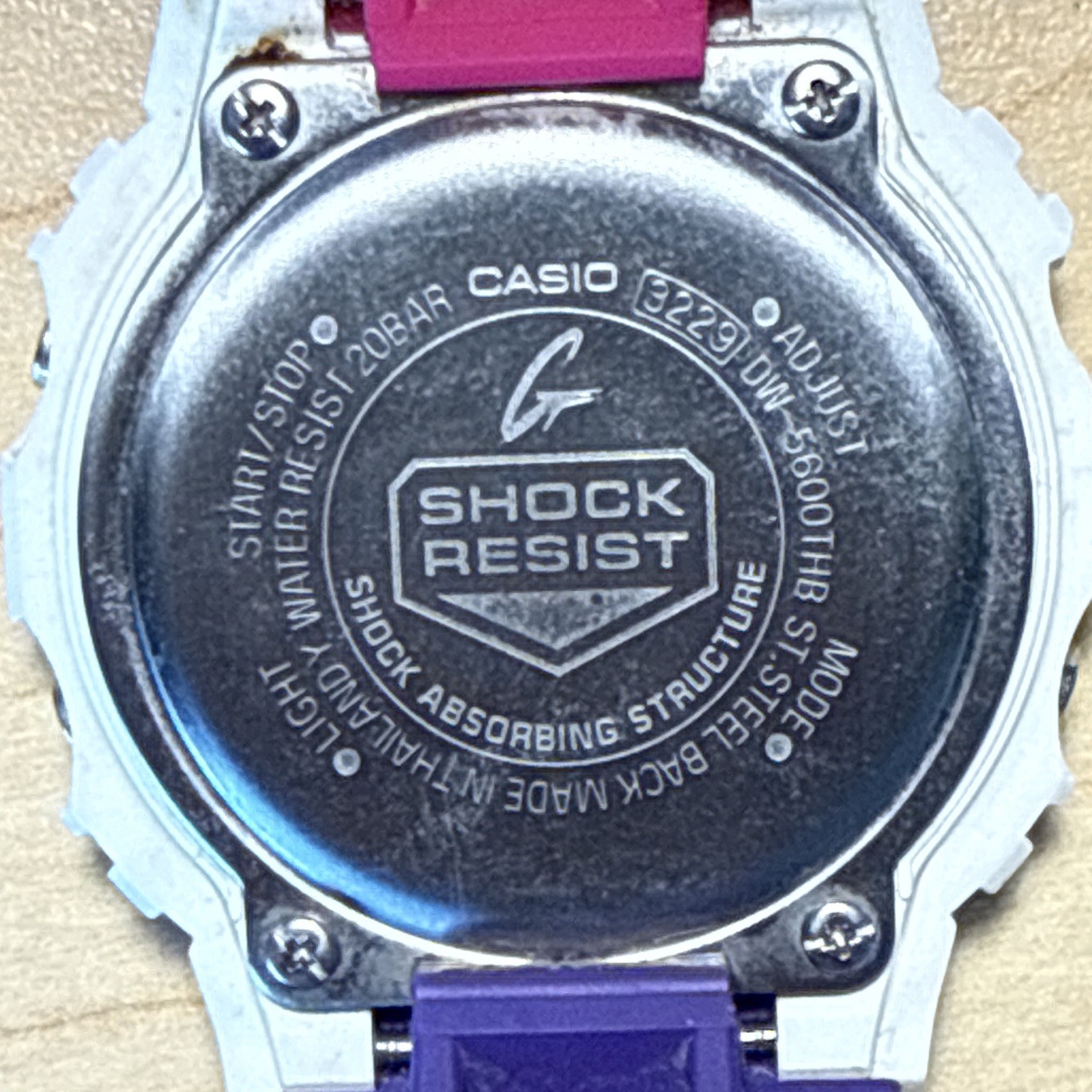 Casio G-SHOCK DW-5600THB Digital Watch White Resin Case Pink/Purple Band 200m
