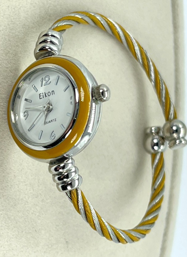 Watch Eikon Quartz White Face, Silver Numbers, 7′ Gold/Steel Twist Bracelet