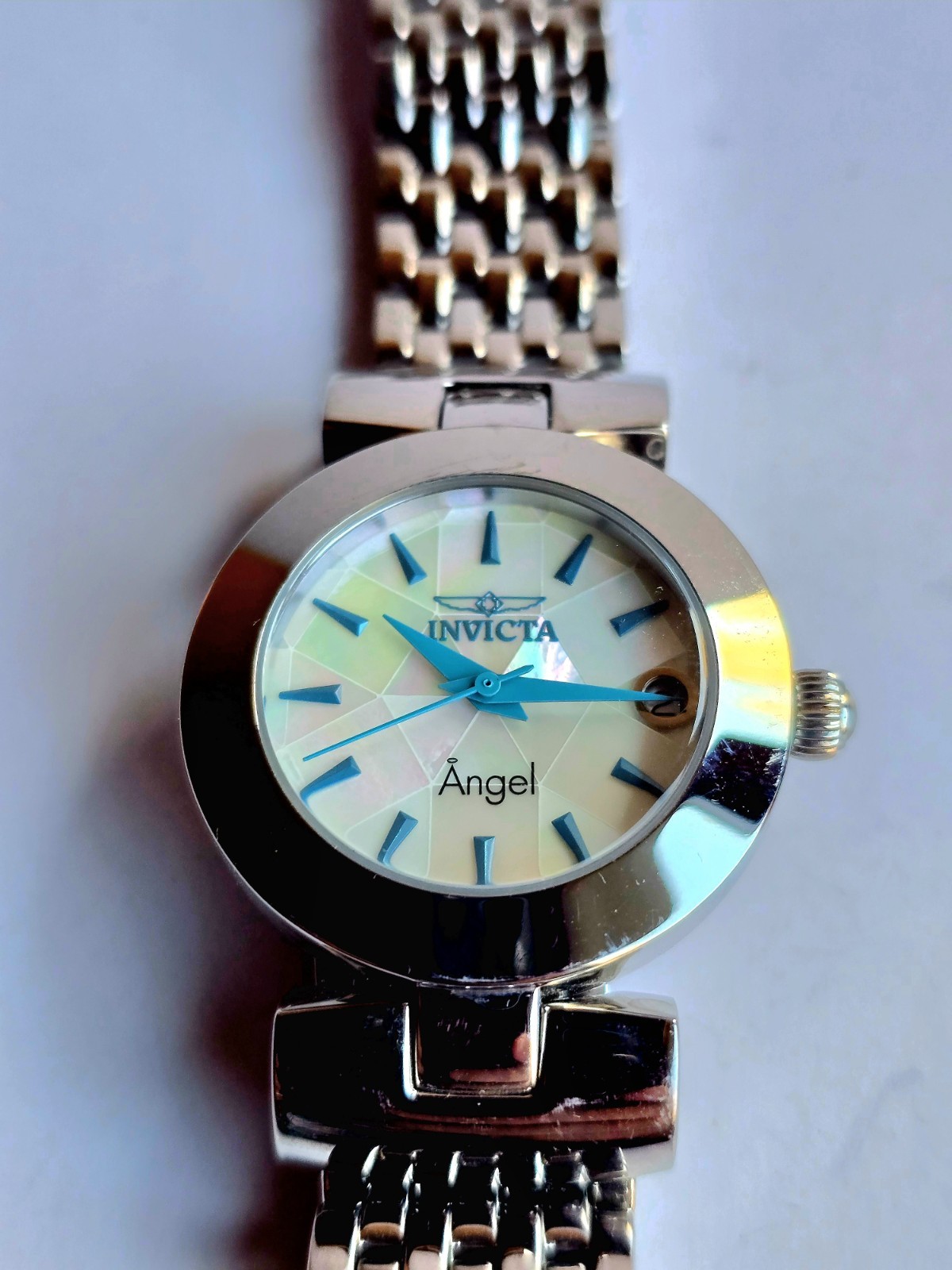 Invicta Angel Watch 15869 Mosaic Face, Silver Color, Blue Hands & Indices Runs