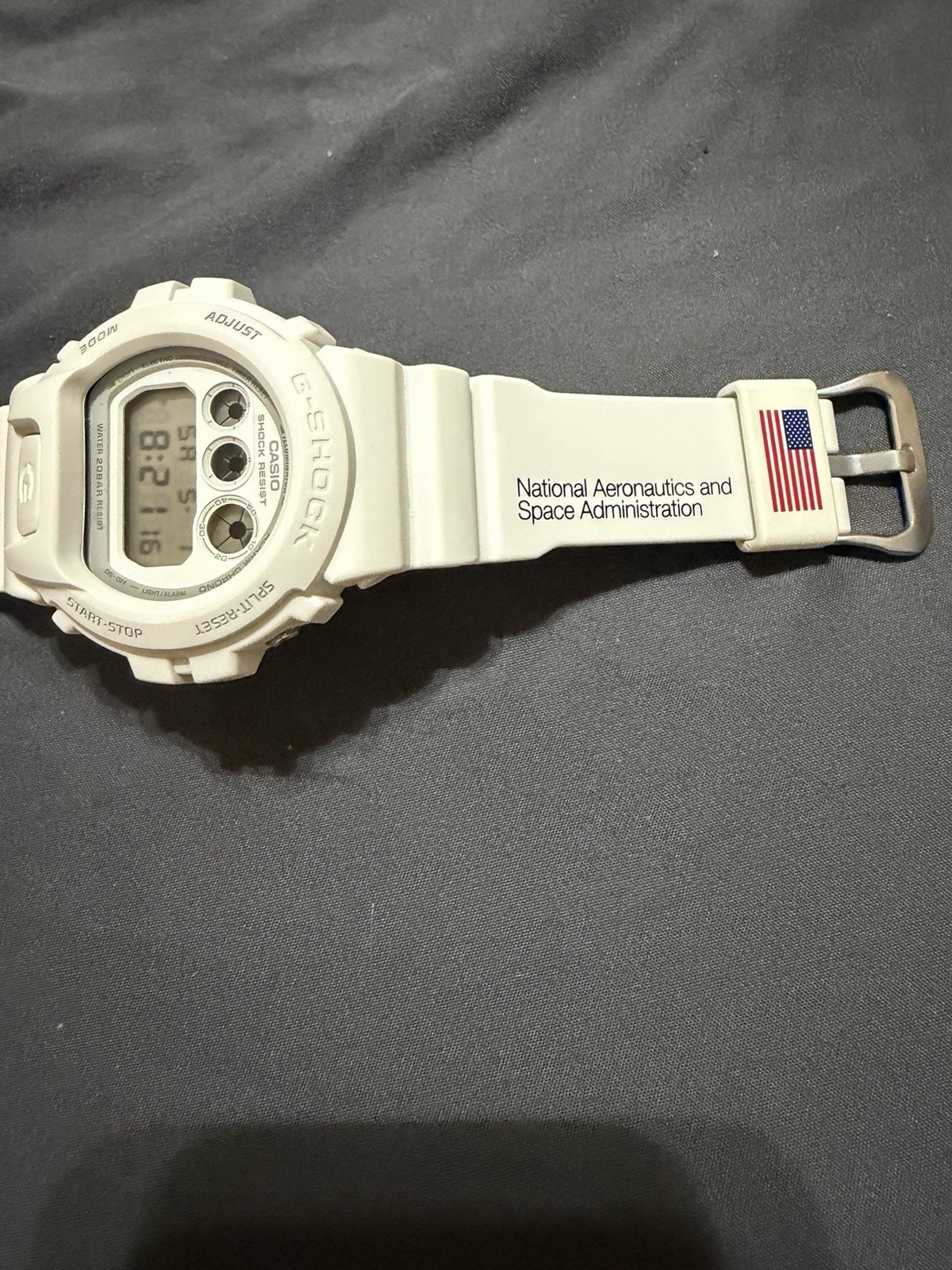 Casio Men’s G-Shock DW6900NASA237 Watch White Resin Case and Strap
