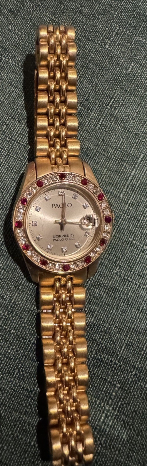 Paolo Gucci quartz wristwatch gold tone diamond markers jeweled bezel date