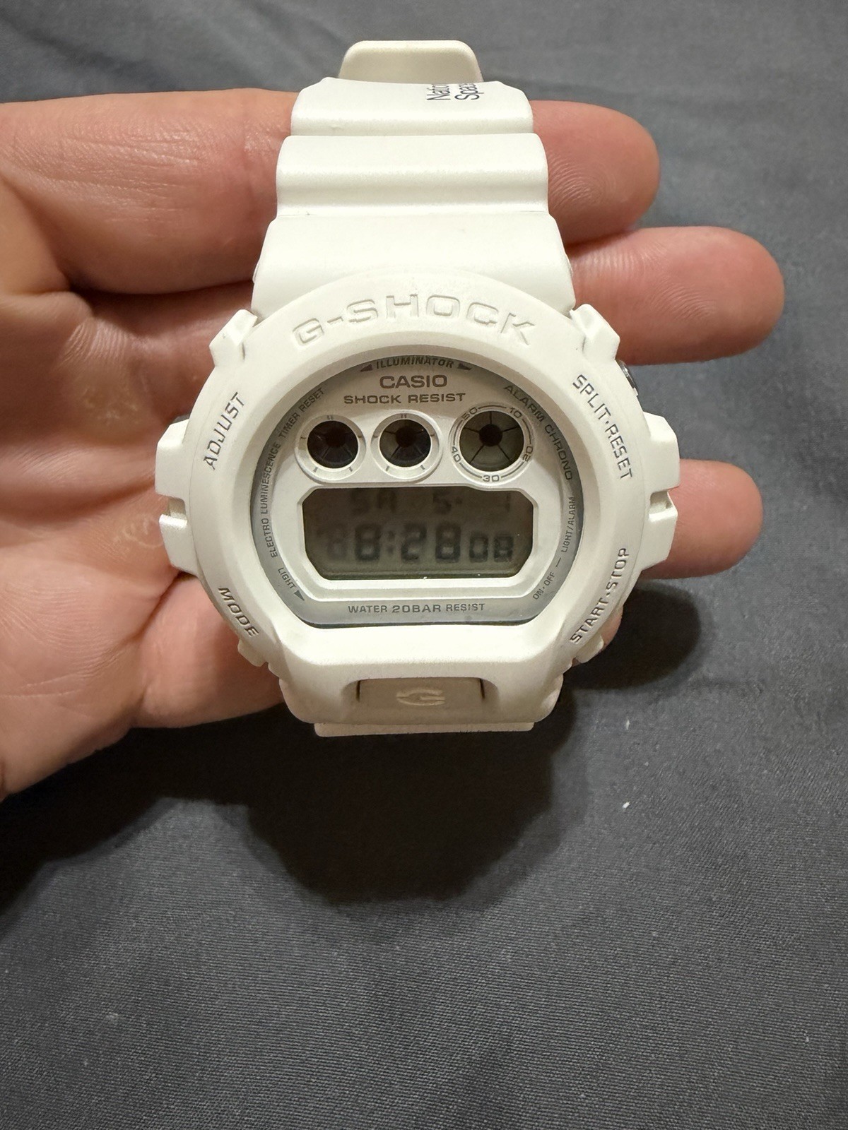 Casio Men’s G-Shock DW6900NASA237 Watch White Resin Case and Strap