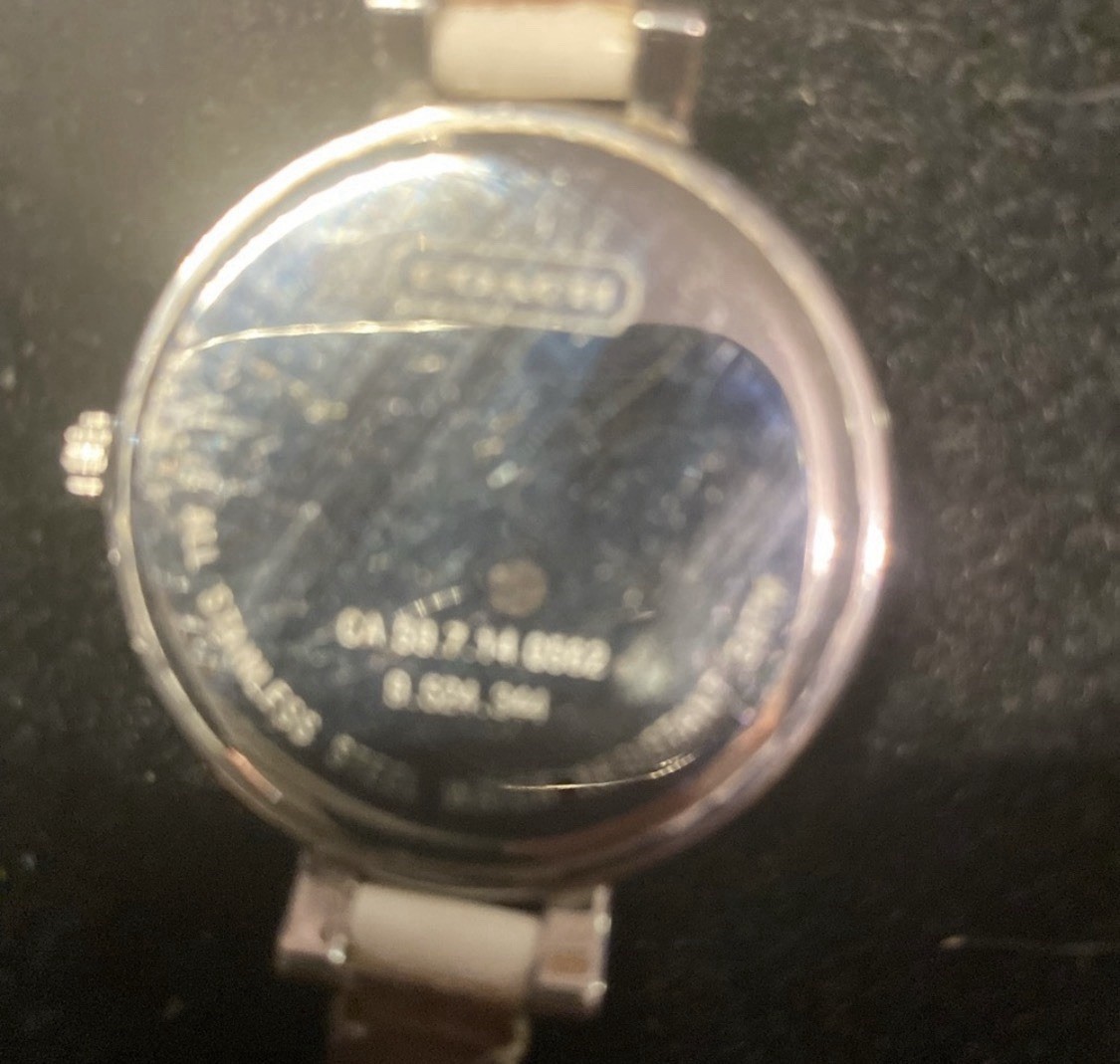 Coach ladies’ Sabrina 14501433 stainless steel silver quartz watch.