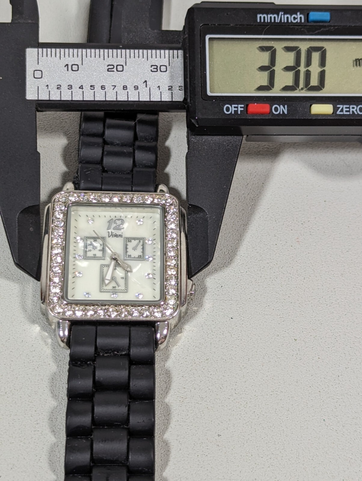 Vivani Pearlized Dial Silver Tone Crystal Accent Rectangle Case Black Band Watch