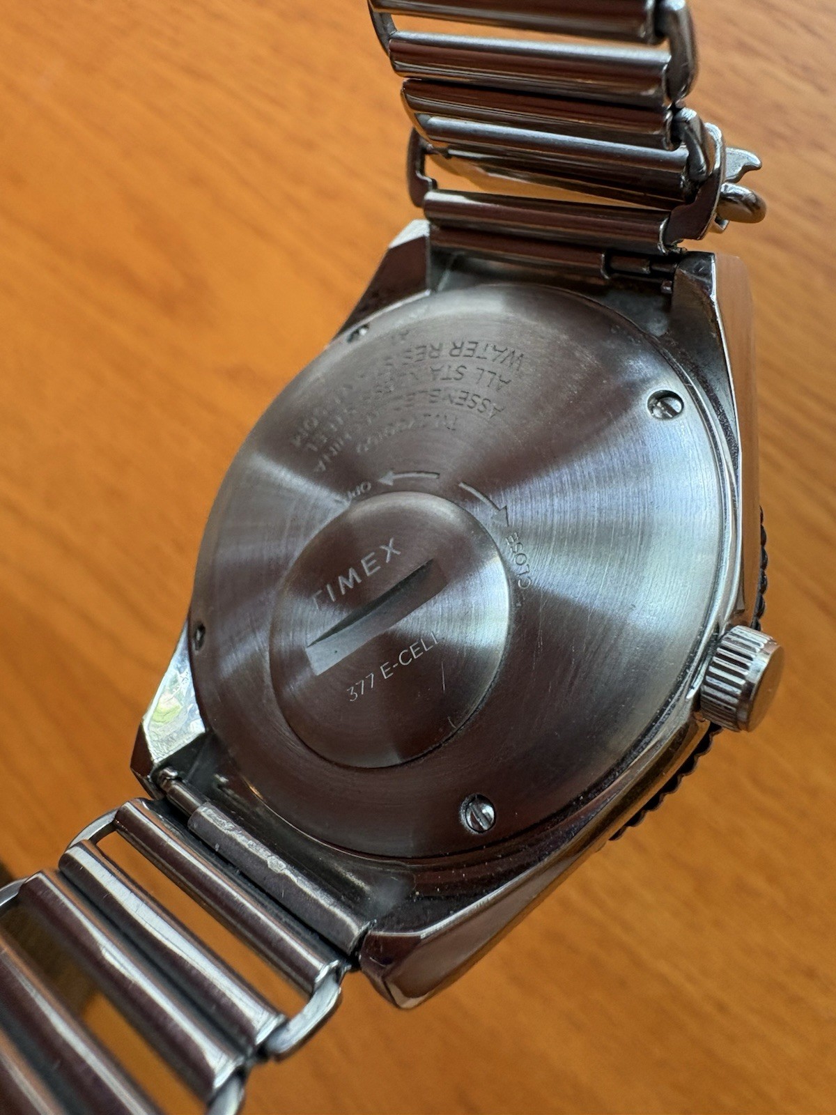 Timex Q Reissue, 12-hr dual-time bidirectional bezel, Bonklip-style bracelet.