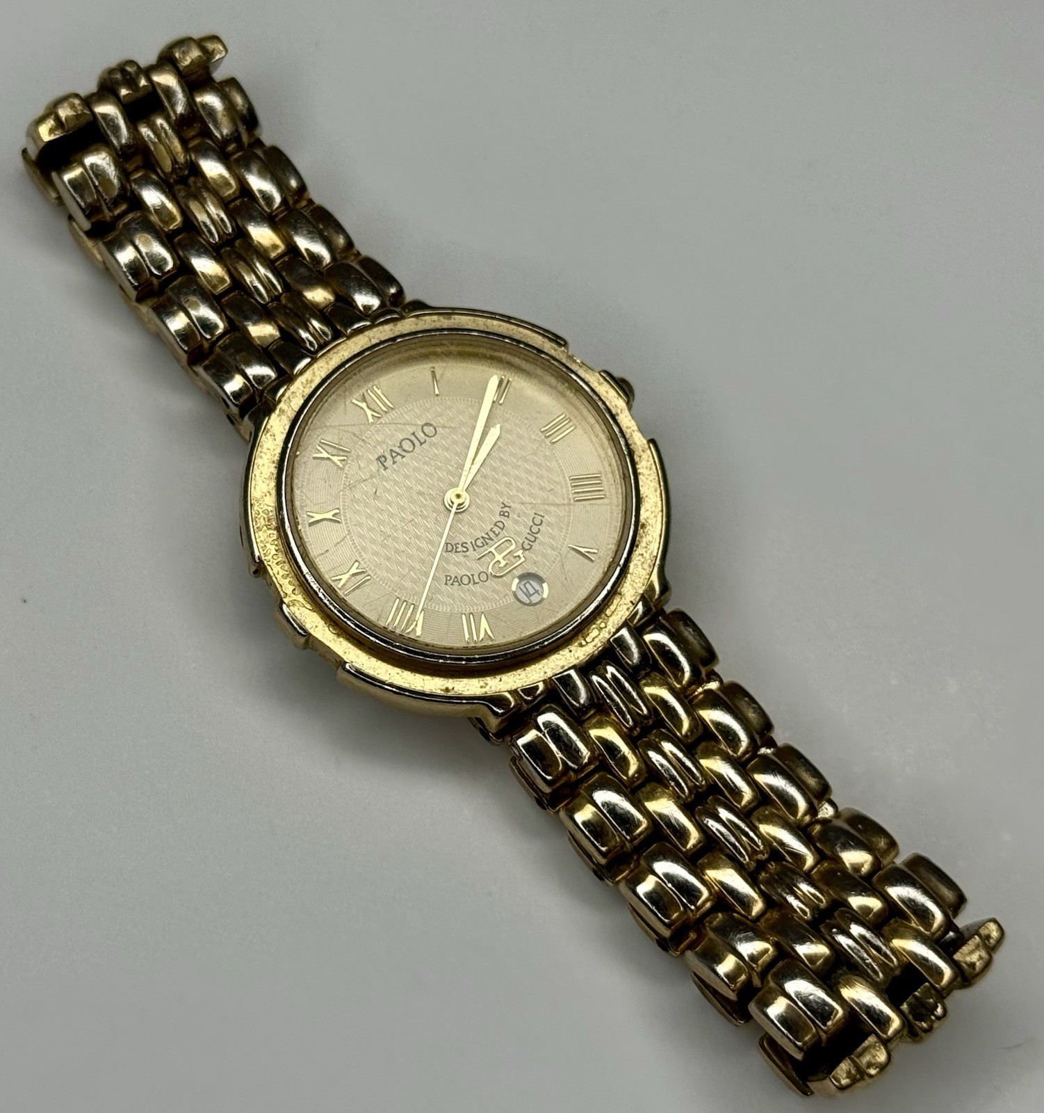 Vintage Paolo Gucci Womens 31mm Gold Tone Day Date Watch Stretch New Battery 8”