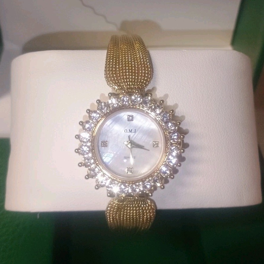O.M.J Quartz Gold Metal Bracelet Dress Wristwatch Gemstone Markers