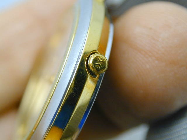 SKAGEN TWO TONE T MADE IN DENMARK RUNS GREAT, CRYSTAL FLAWED AS PICTURED.