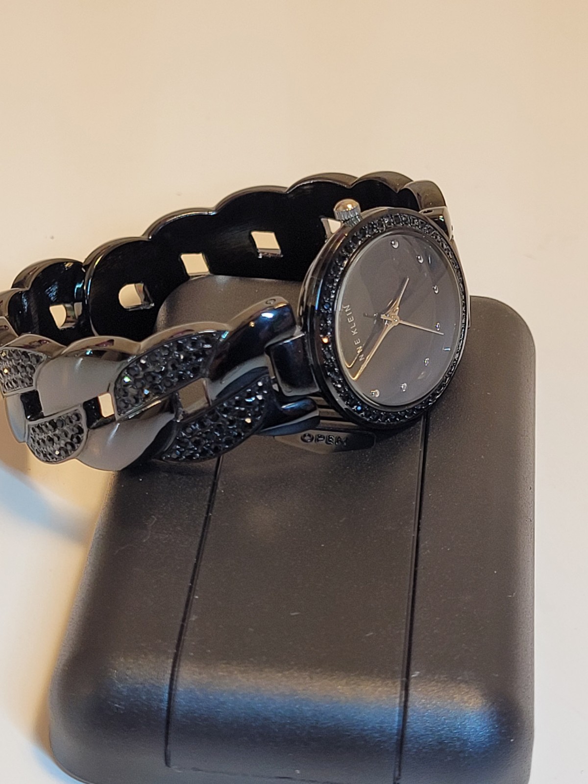 Anne Klein Women’s Black Stainless Bracelet Quartz Analog Watch Gem-Set Bezel