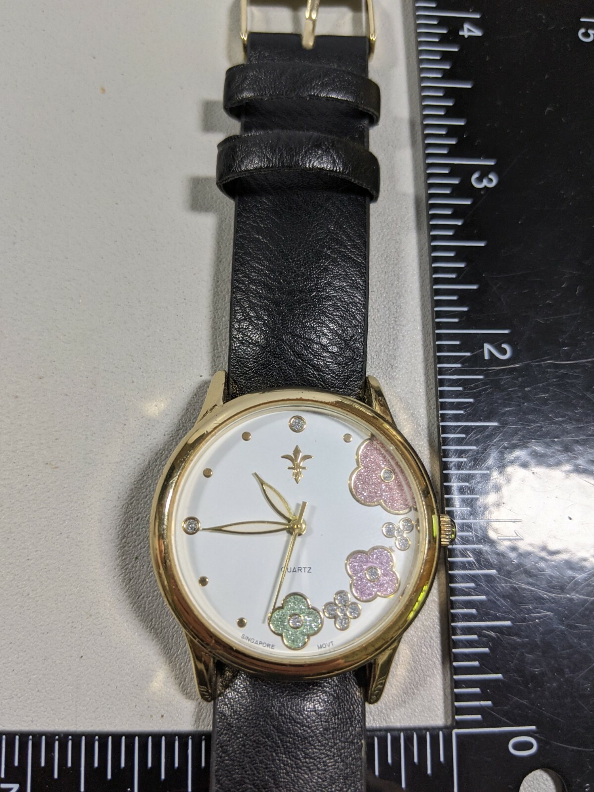 Green Pink Purple Round Gold Tone Case 34 mm Black Faux Leather Band Watch 9 In.