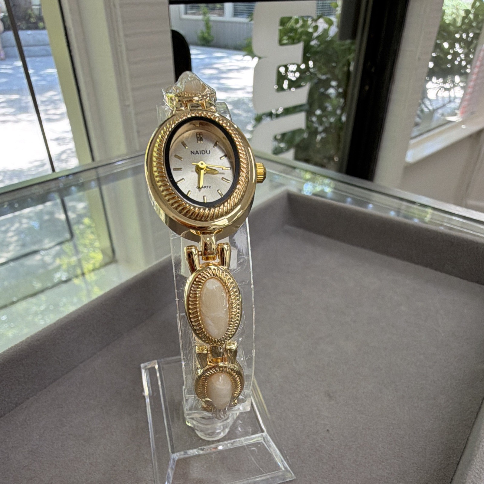 NAIDU Women’s Quartz Analog Oval Watch Gold Tone Bracelet White Dial