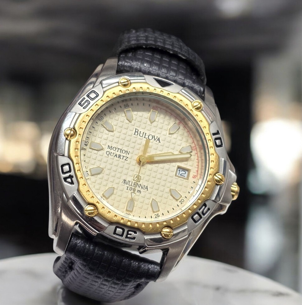 VINTAGE 98G36 BULOVA MOTION QUARTZ KINETIC MILLENIA 100M WATCH NEW NOT WORN