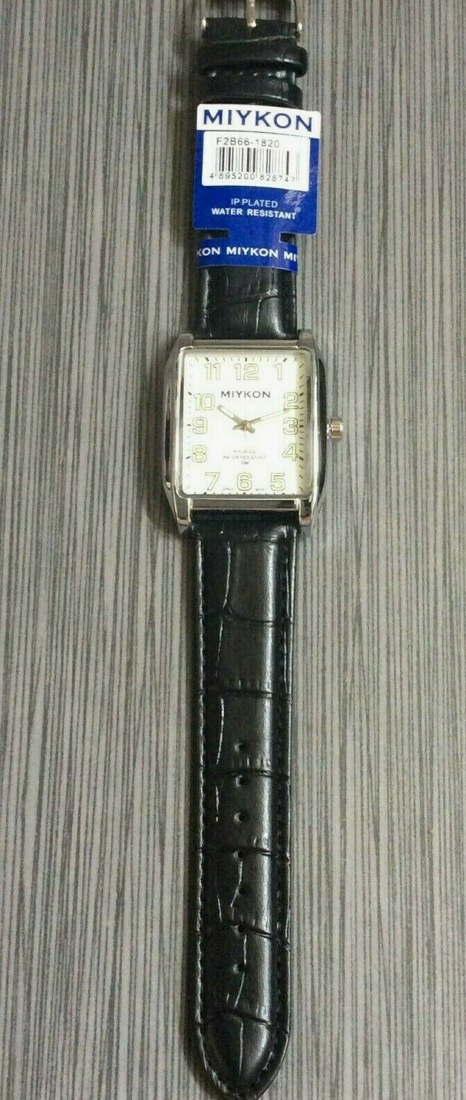 Miykon Men’s Watch Rectangle White Dial Green Arabic Hours on Black Leather Band