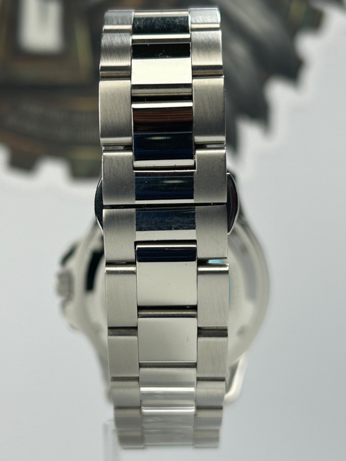 Nibosi NI2596 Mens Automatic 42MM Day/Date Silver Tone Blue Dial Exhibition Back