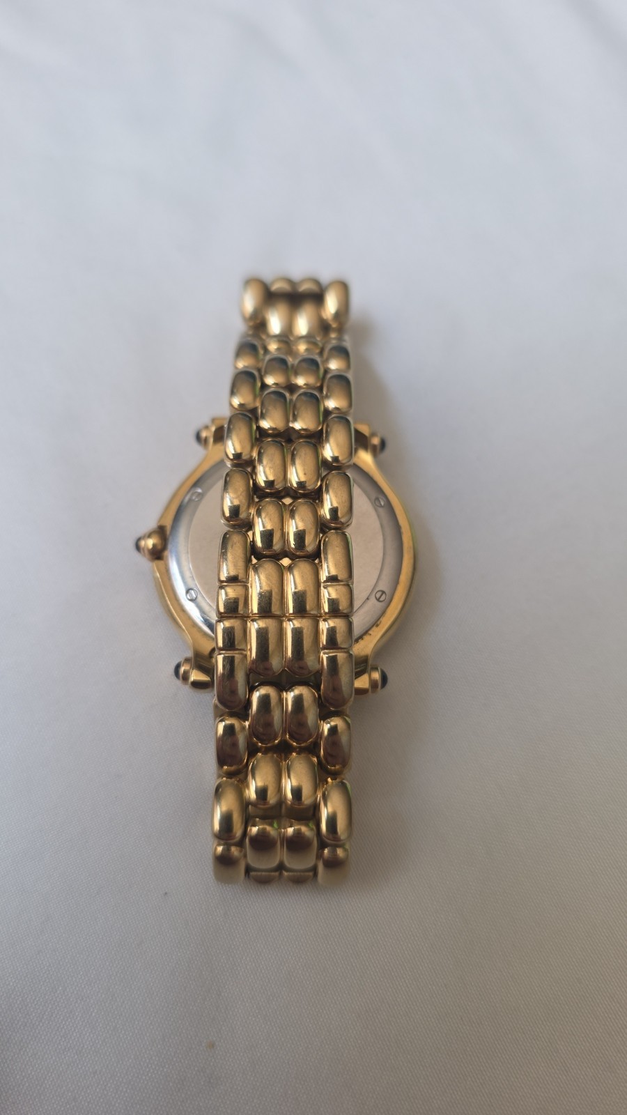 Gold Chopard Geneve black face happy sport watch