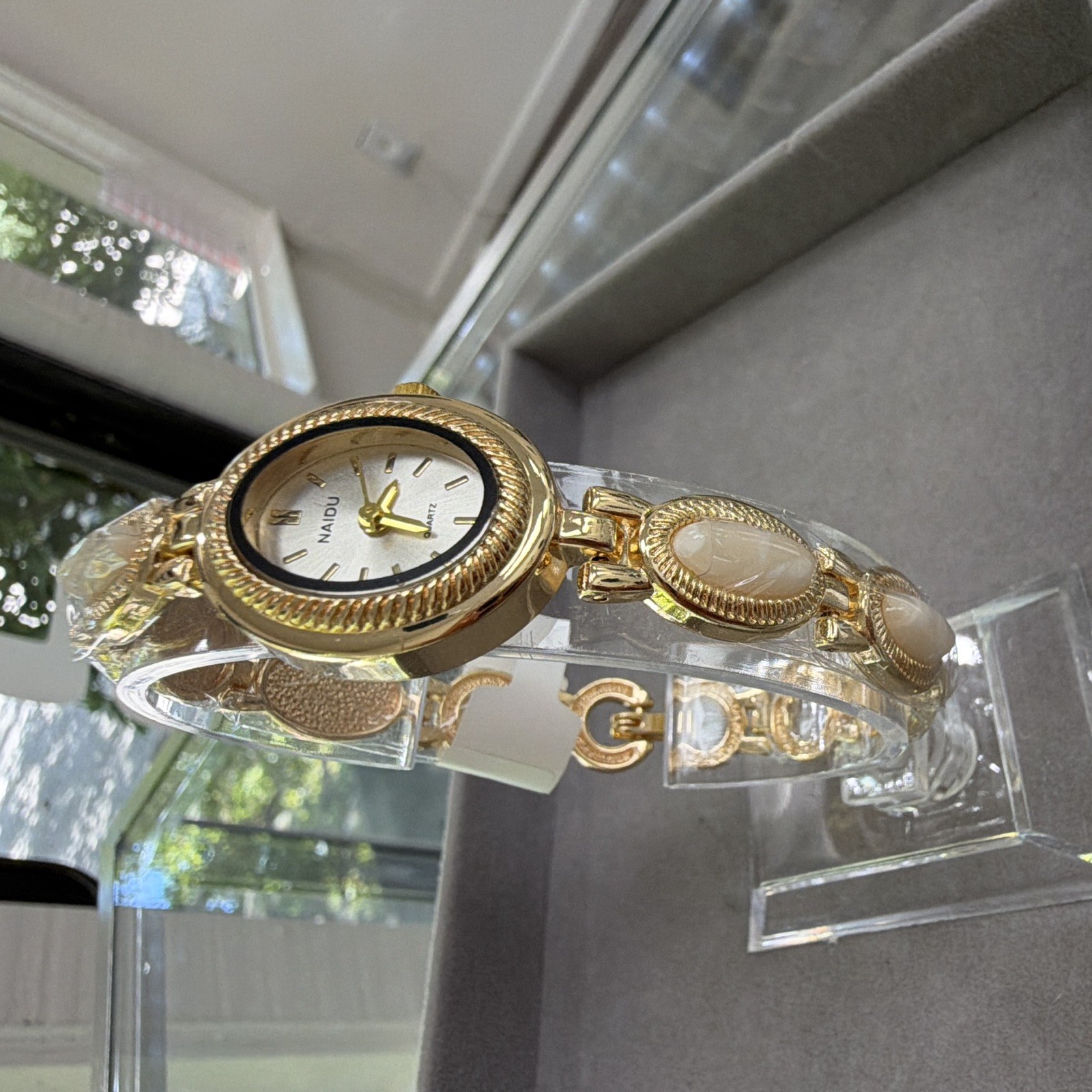 NAIDU Women’s Quartz Analog Oval Watch Gold Tone Bracelet White Dial