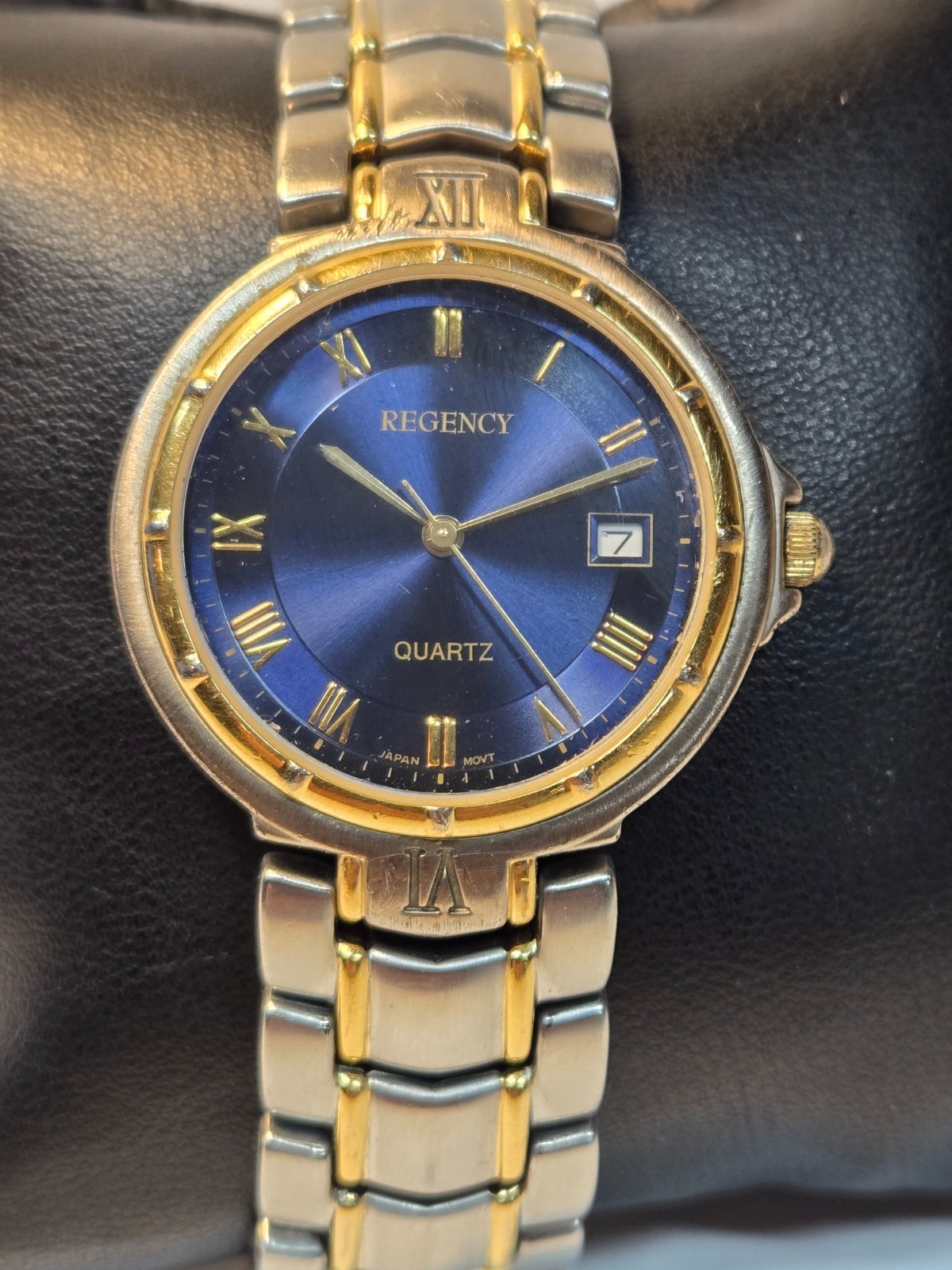 Regency Quartz Analog Wristwatch Dark Blue Dial Roman Date Two-Tone Bracelet