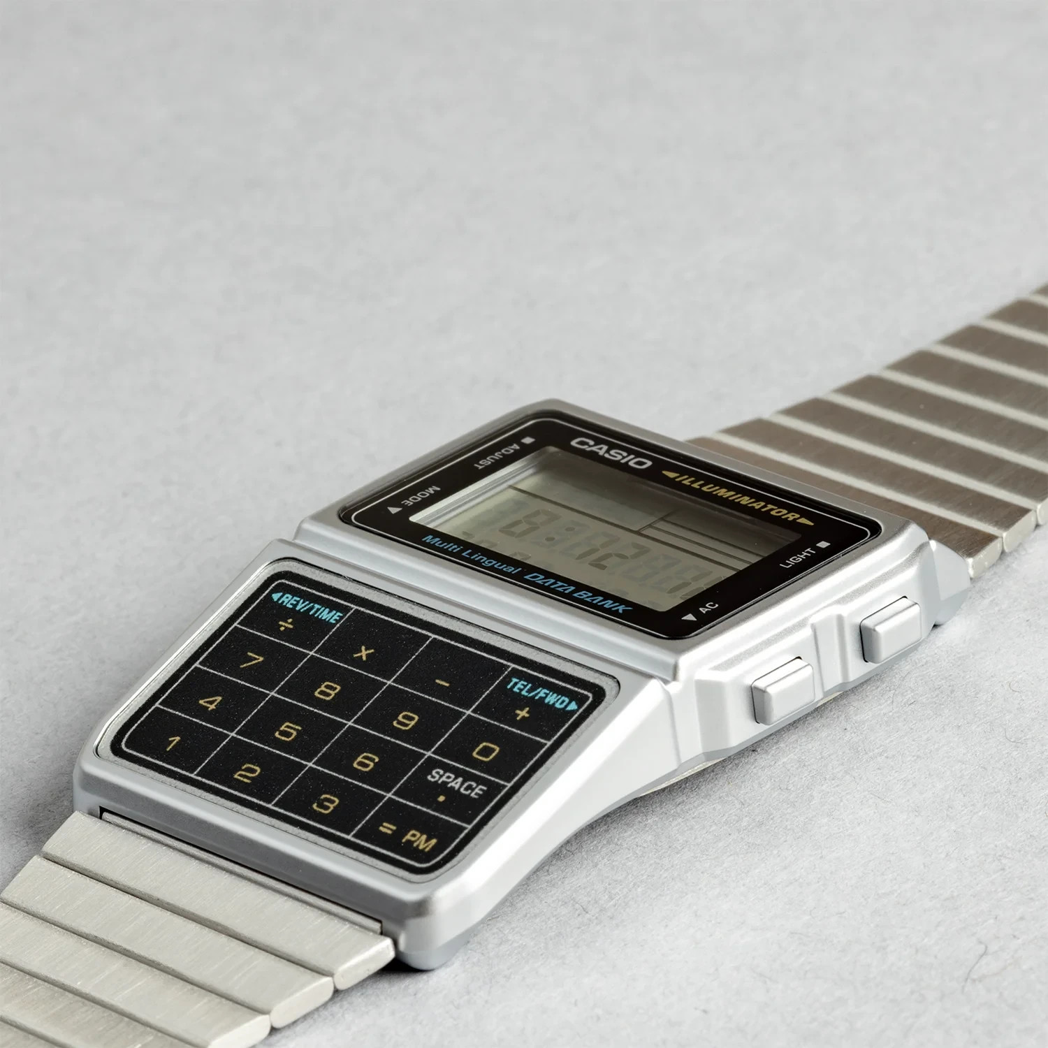 Casio DBC-611-1 Databank Calculator Alarm Telememo Stopwatch Stainless Steel