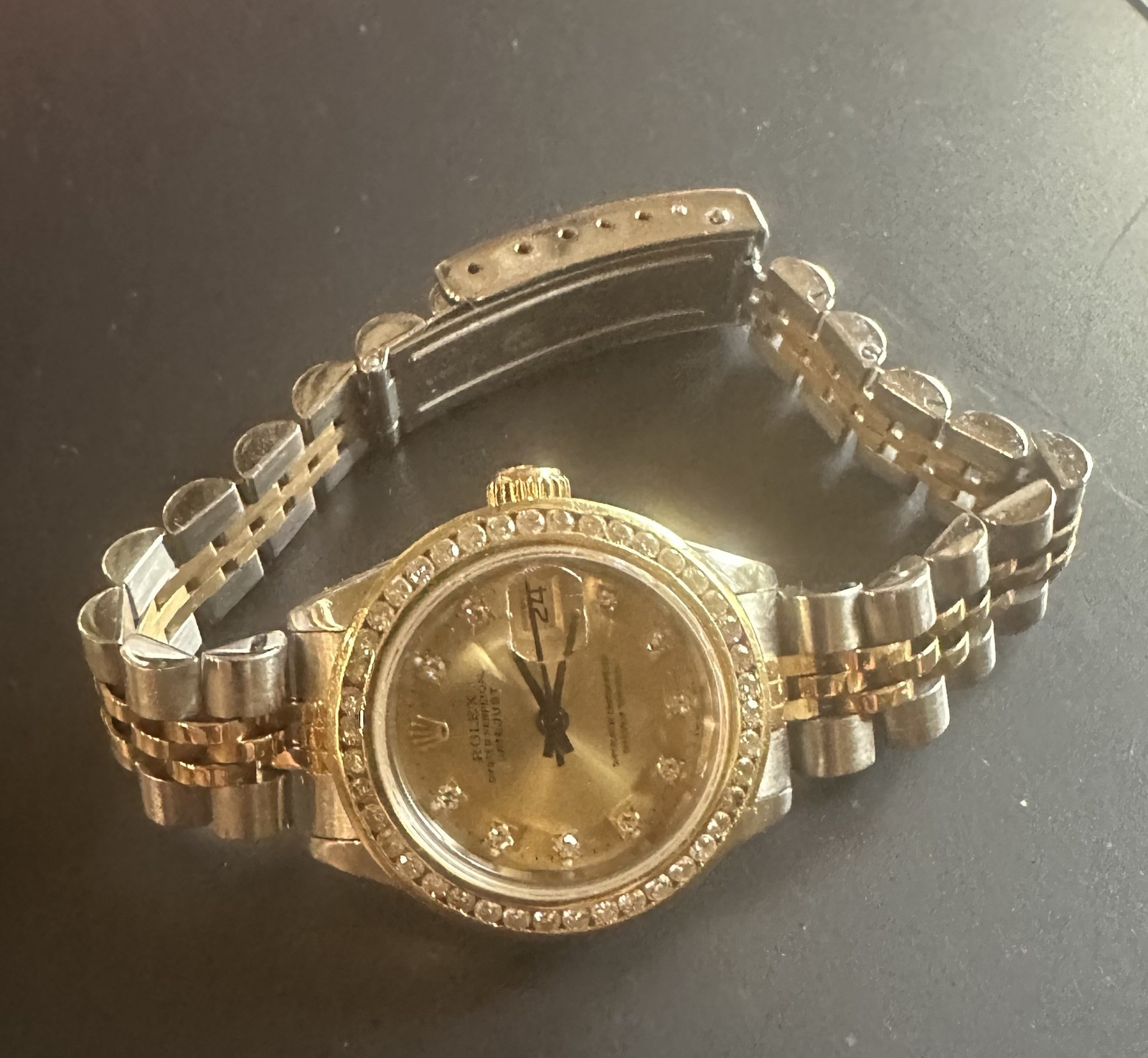 ladies rolex watch diamond dial and bezel