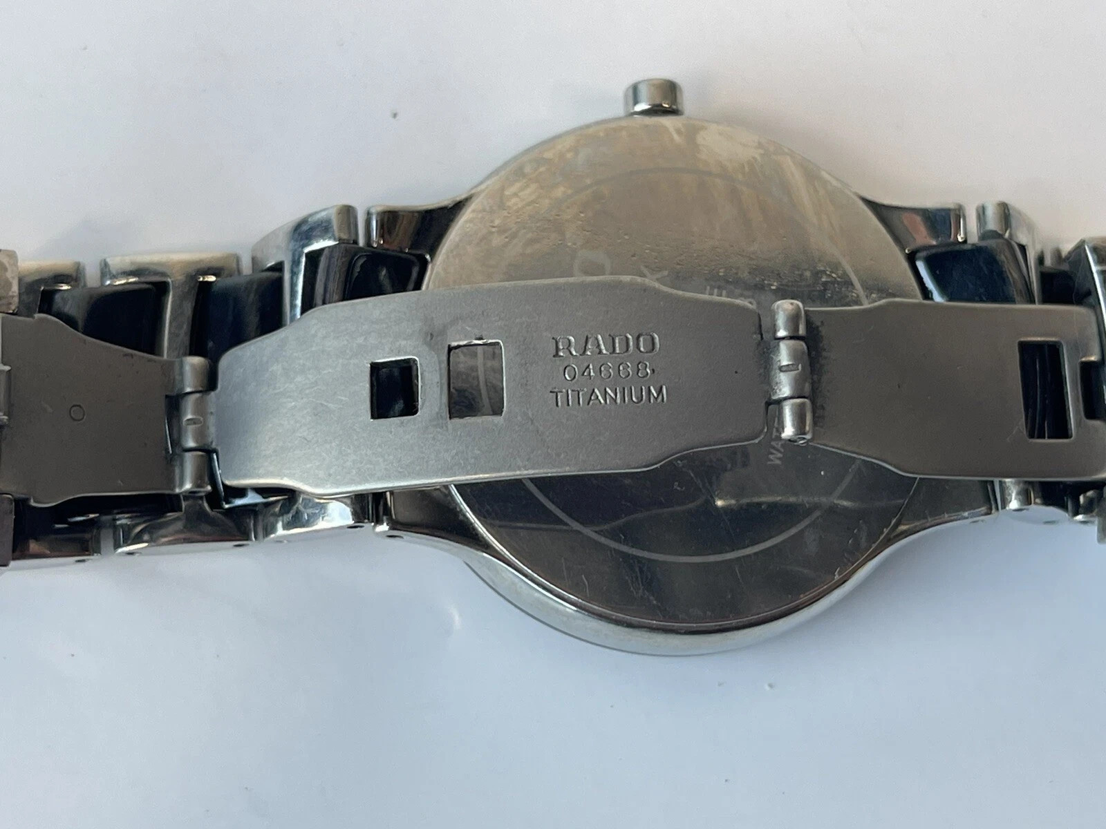 Rado Centrix Black Dial Unisex Watch, ceramic bracelet with titanium clasp.