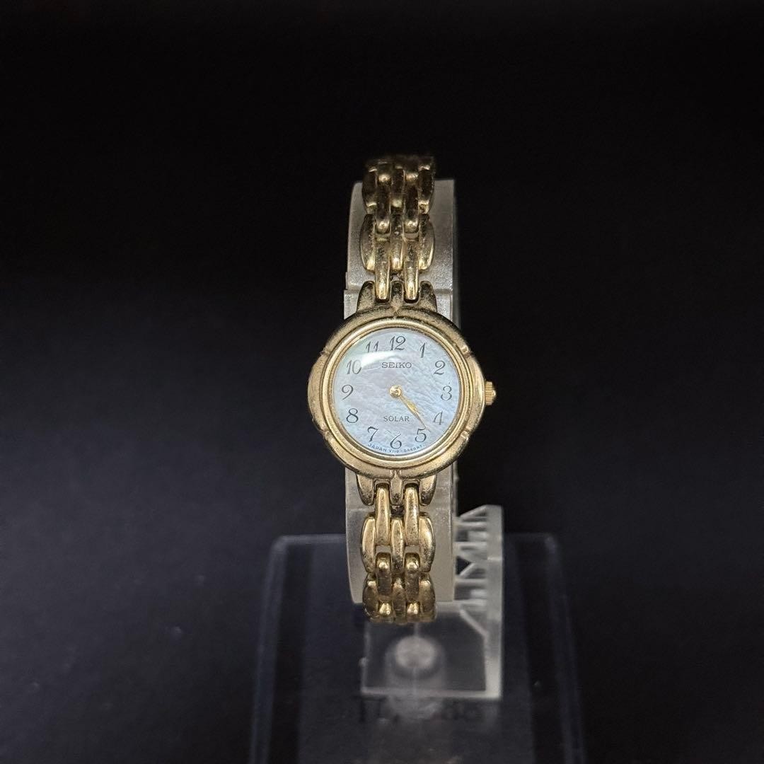 SEIKO V110-0A70 Watch with Chain and Shell Dial