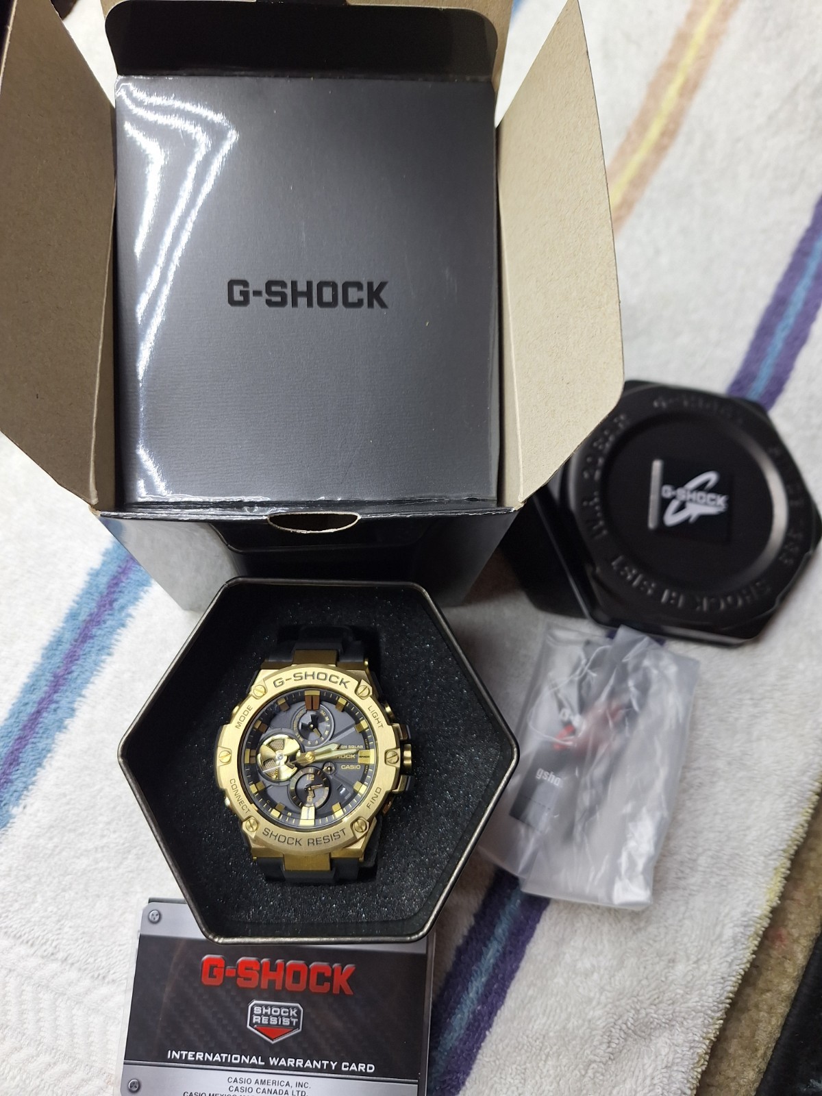 Casio G-SHOCK GST-B100 Bluetooth 200m Black Dial Gold Case Resin Strap Box