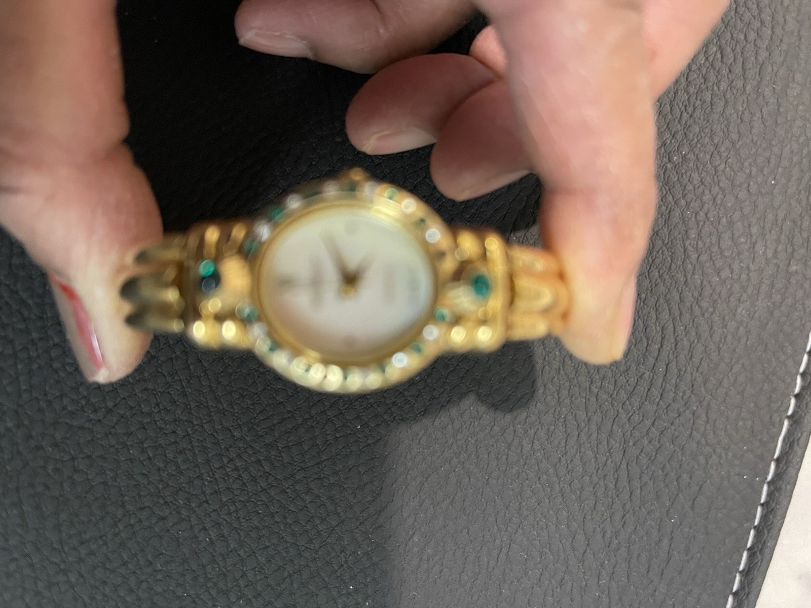 Gold-Tone Gem-Set Bangle Wristwatch with Green Stones & White Dial Analog
