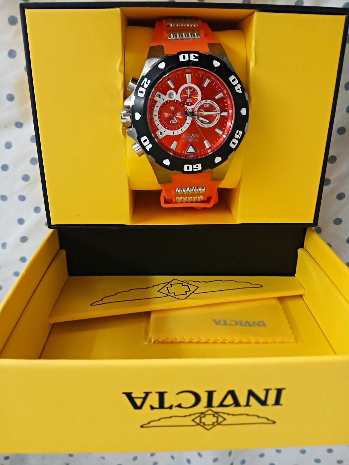 Invicta Pro Diver Men’s Quartz Chronograph Tachymeter Red Dial Orange Strap 52mm