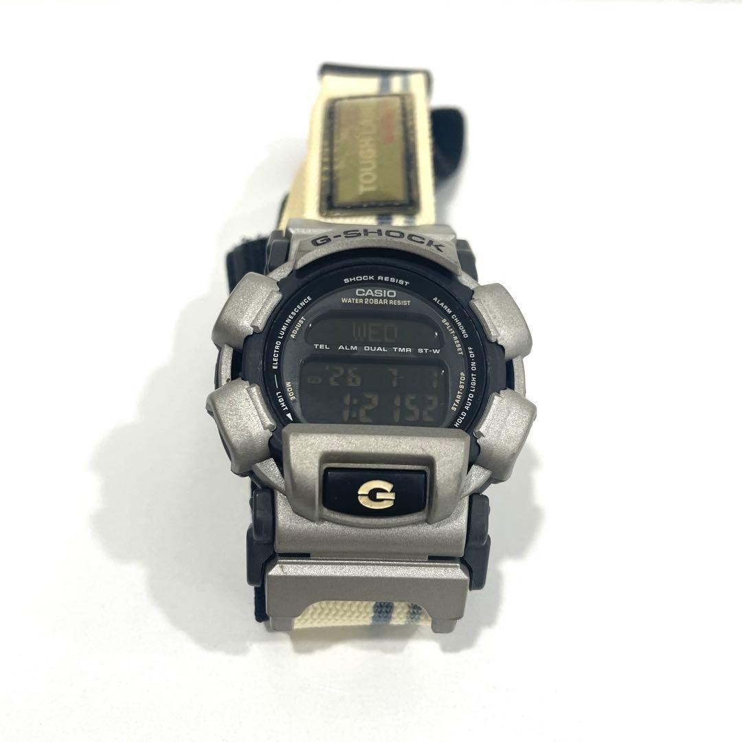 Working condition CASIO G-SHOCK digital watch DW-003, bezel missing.