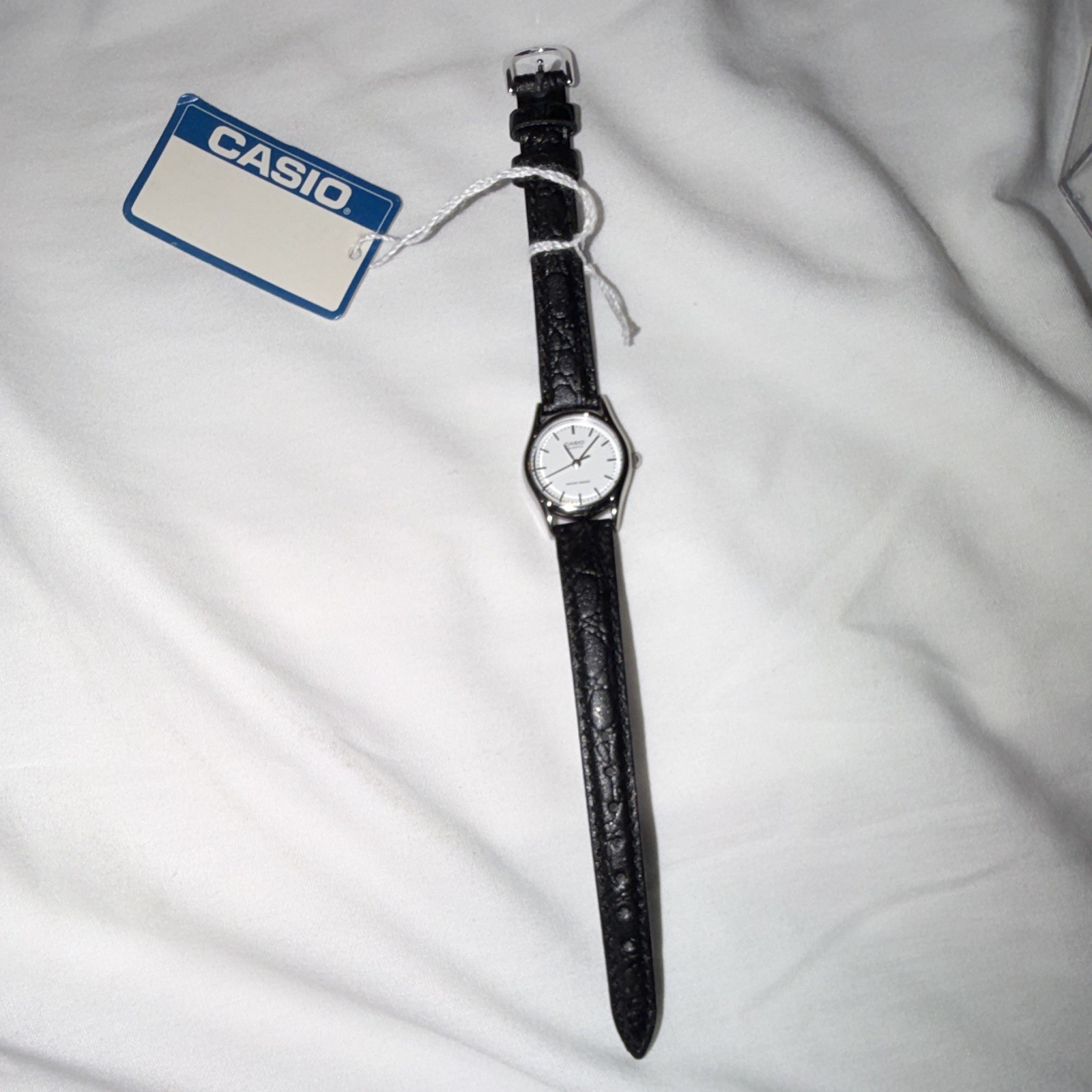 Casio Women’s Analog Quartz Wristwatch White Dial Black Leather Strap