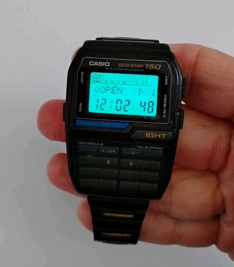 Casio Data Bank 150 DBC-150 1477 Calculator Watch New Battery Works