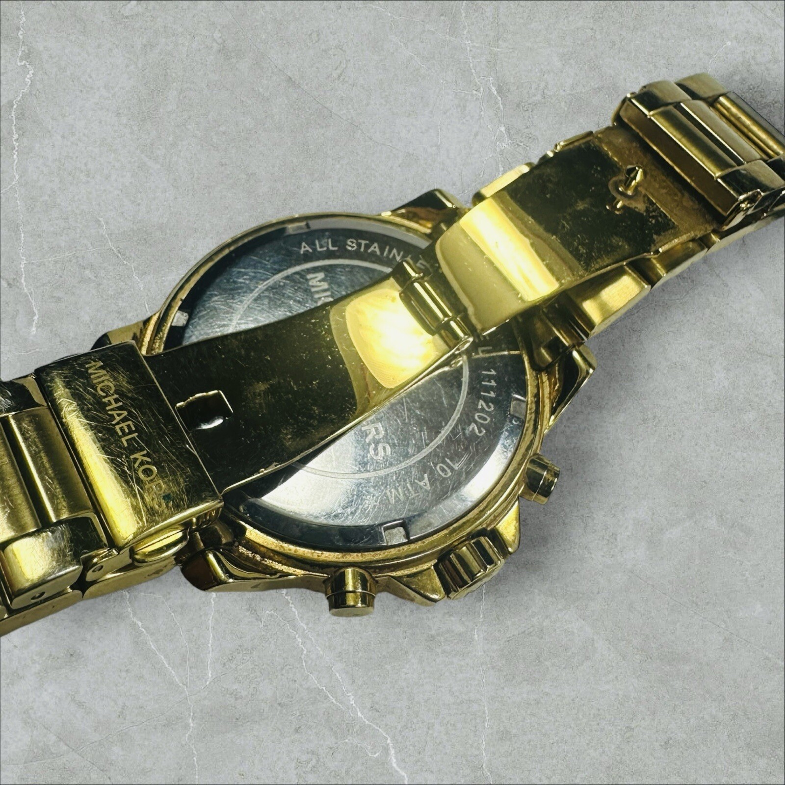 Michael Kors Rox Gold Tone Baguette Crystal Gemstone Bracelet Watch MK5591 45mm