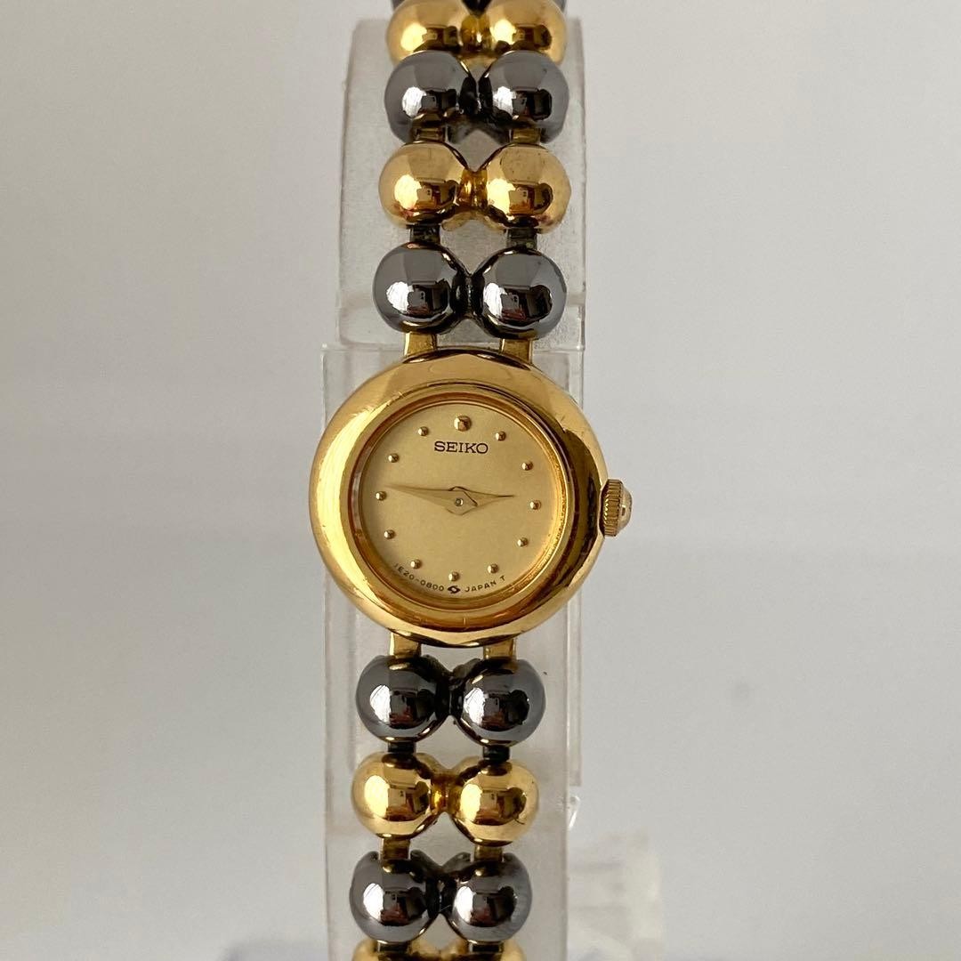 Working SEIKO vintage round black gold elegant