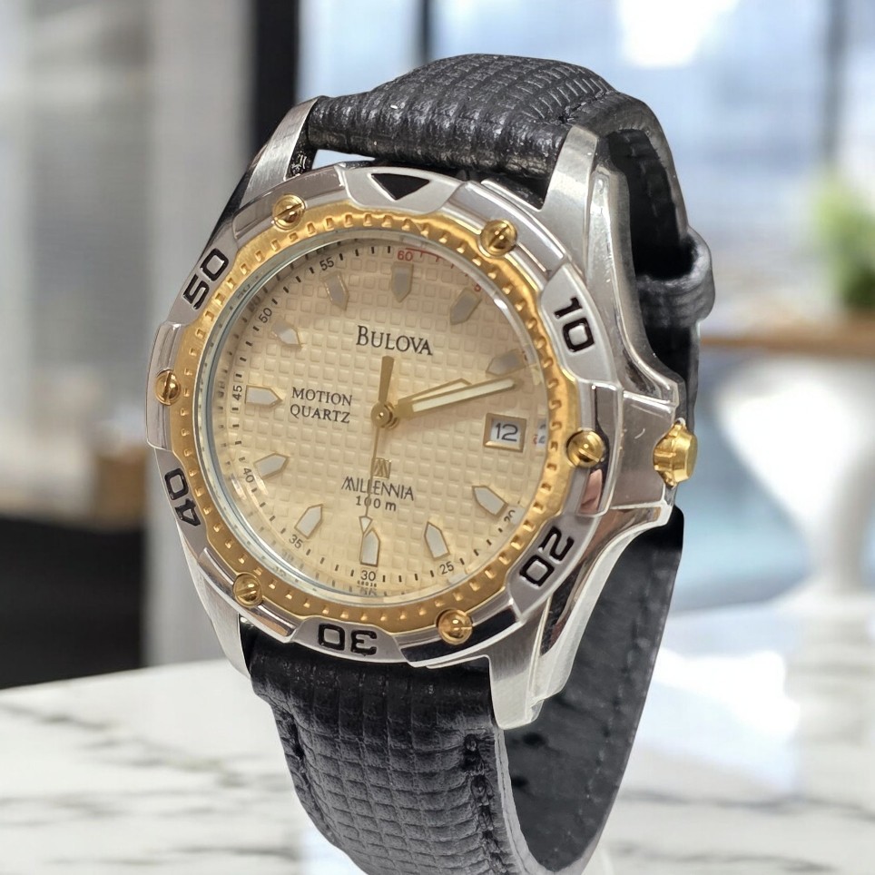 VINTAGE 98G36 BULOVA MOTION QUARTZ KINETIC MILLENIA 100M WATCH NEW NOT WORN