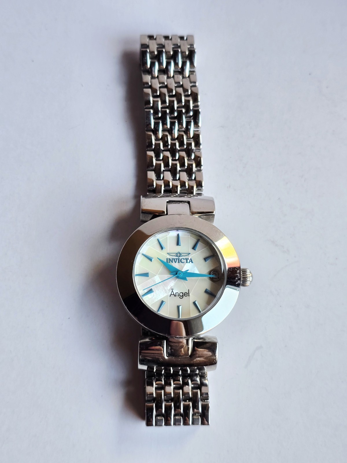 Invicta Angel Watch 15869 Mosaic Face, Silver Color, Blue Hands & Indices Runs
