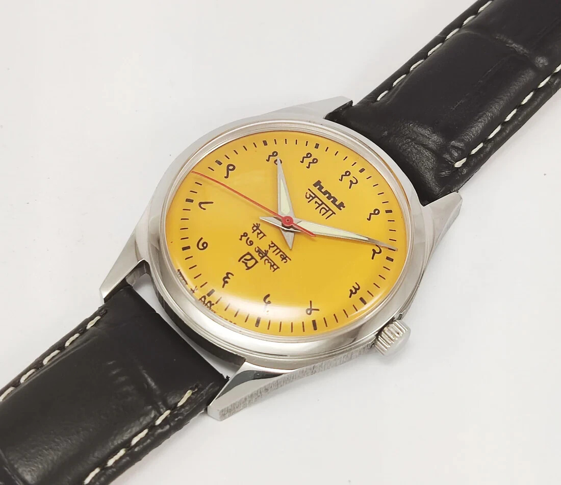 HMT Janata Devanagari Yellow Dial Hand Winding Transparent Back Mens Wrist Watch
