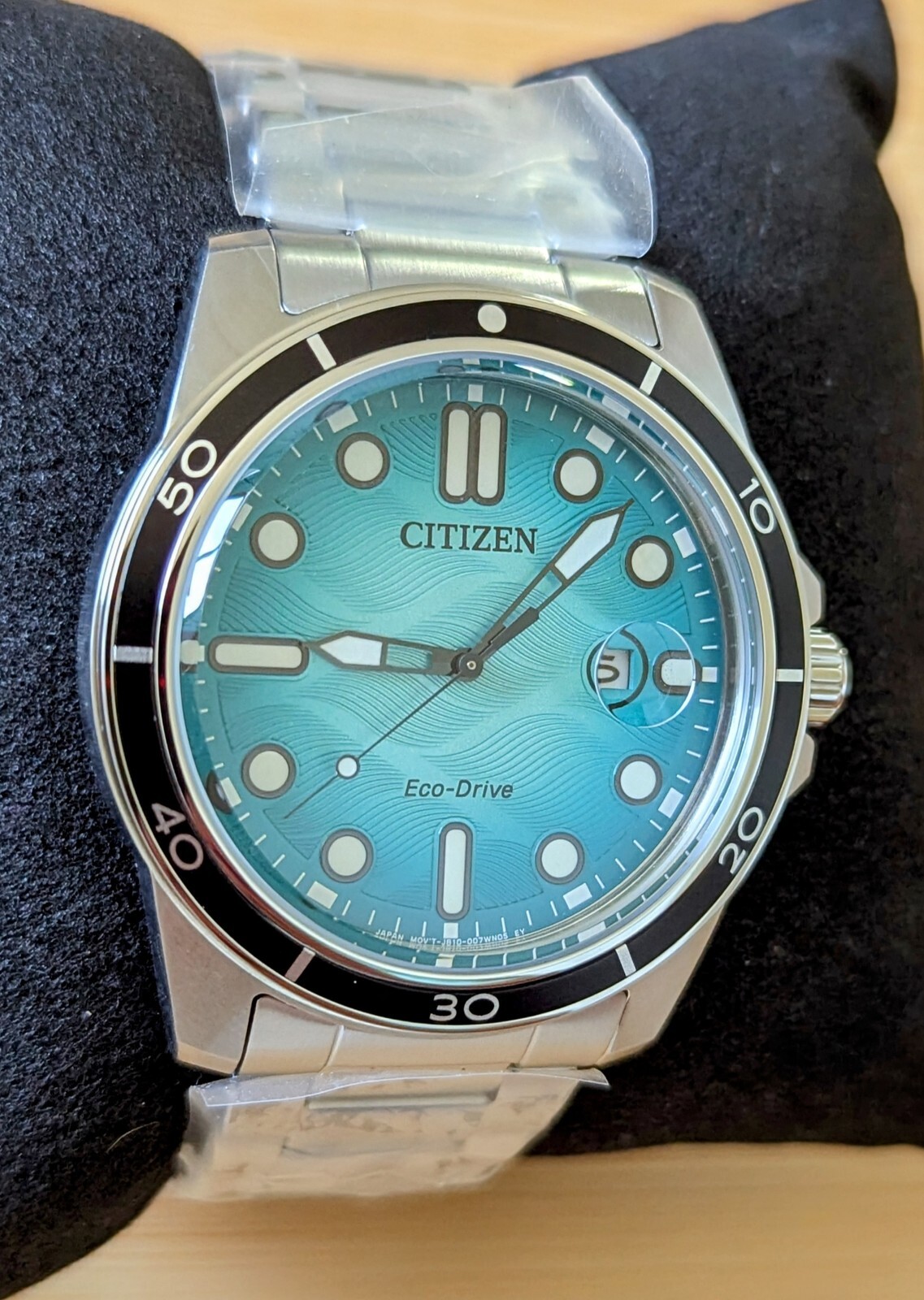 Citizen Turquoise Dial Date Indicator AW1816-89L Silver Tone Men’s Watch