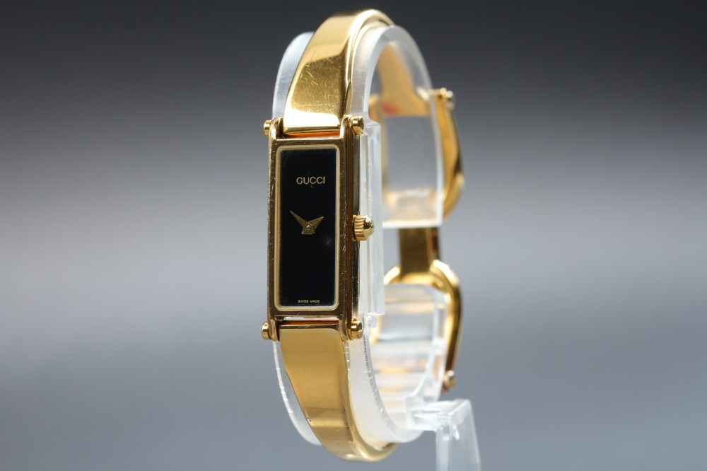 GUCCI 1500 Black Dial Rectangular Gold Bangle Quartz 12mm Ladies Watch