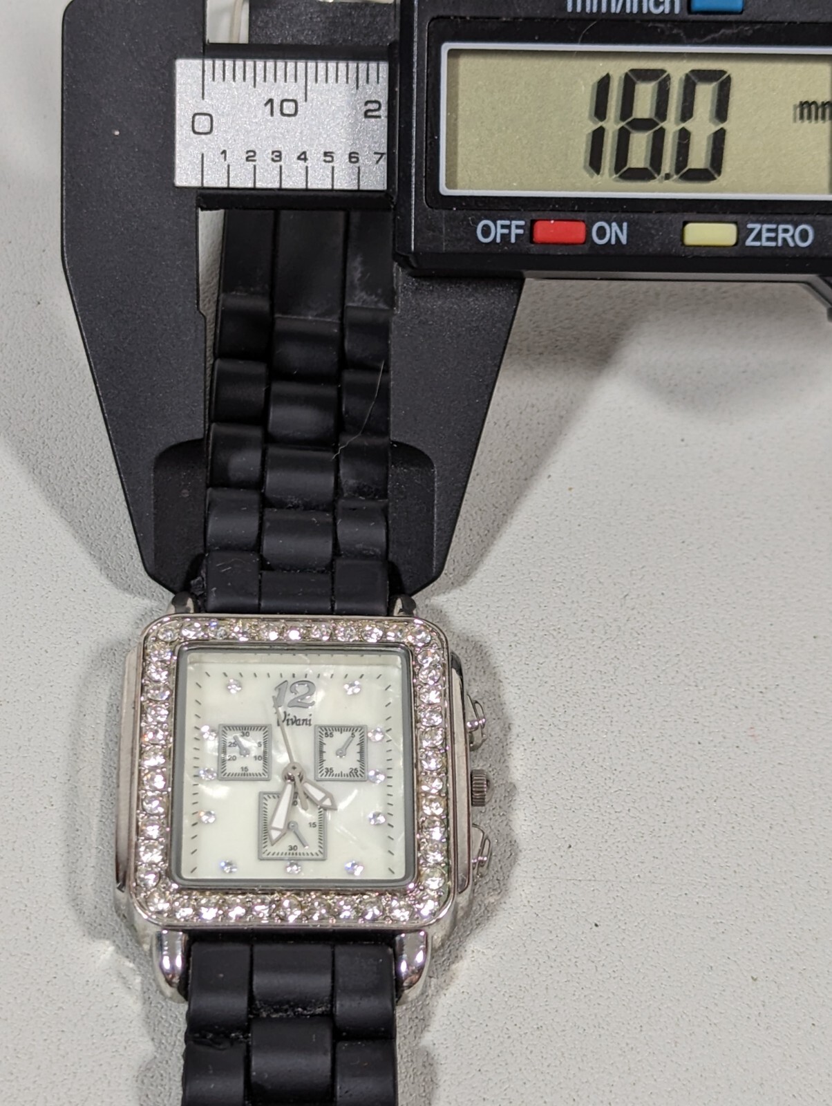 Vivani Pearlized Dial Silver Tone Crystal Accent Rectangle Case Black Band Watch