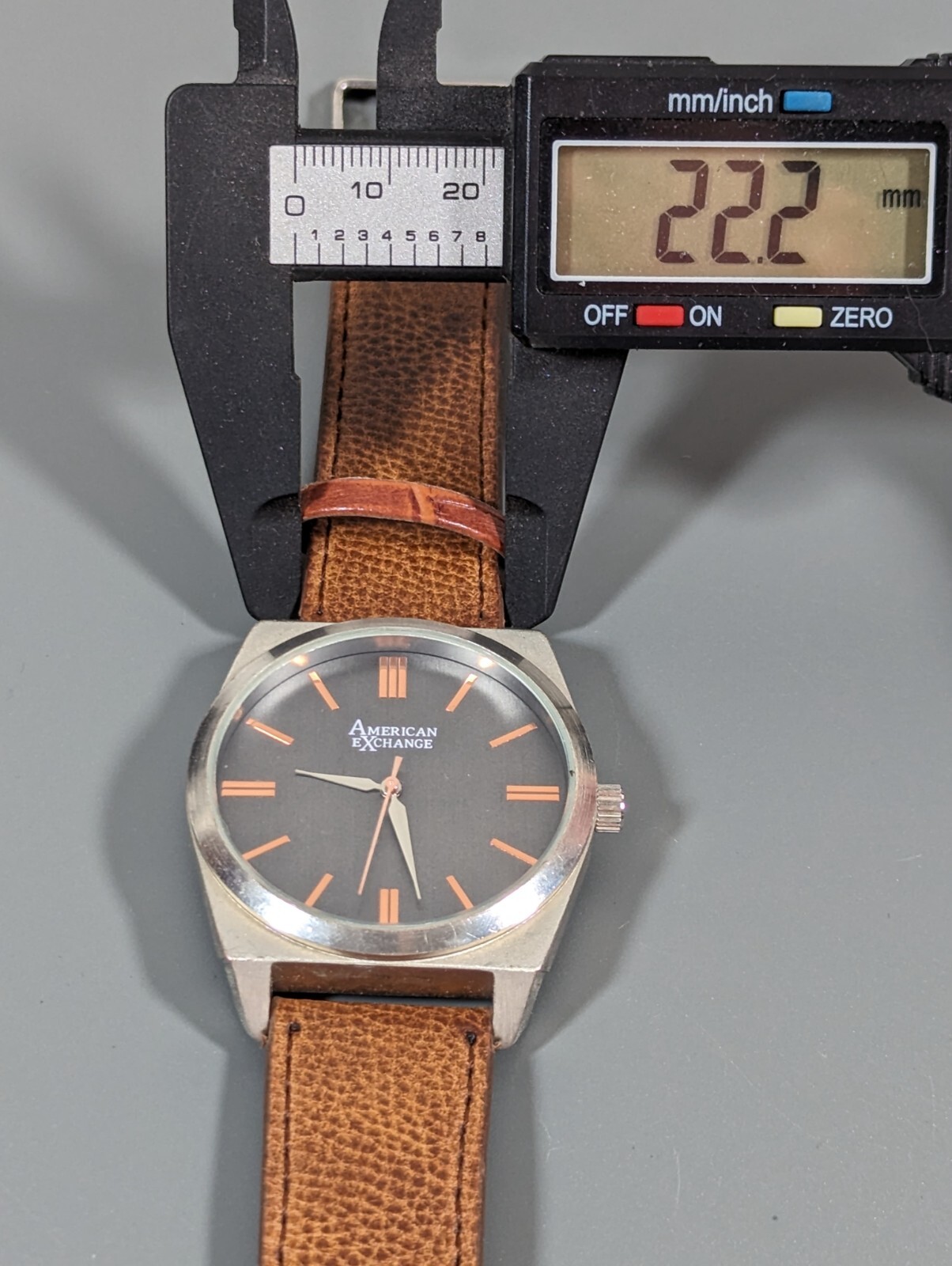 American Exchange Black Dial Round Silver Tone Case Brown Faux Leather Bnd Watch