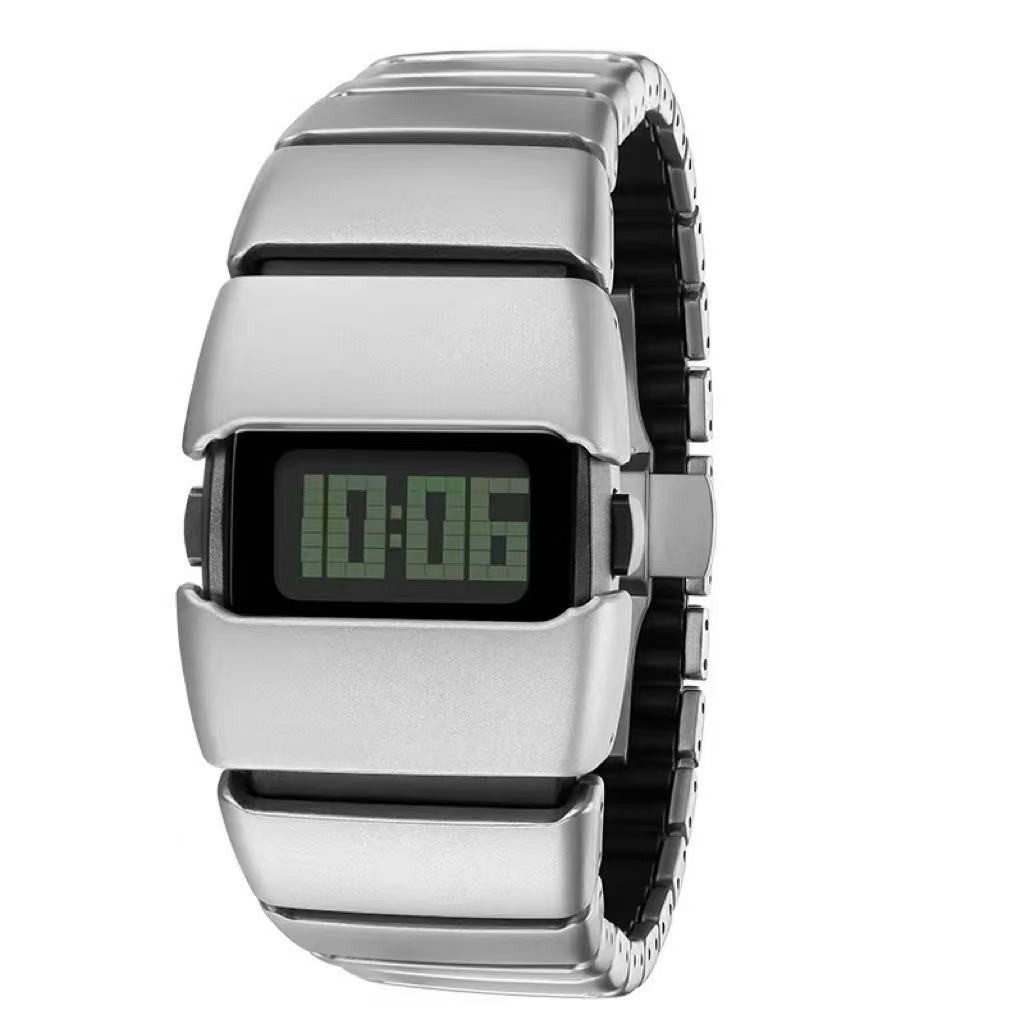 Sleek silver metal digital watch with retro futuristic style.