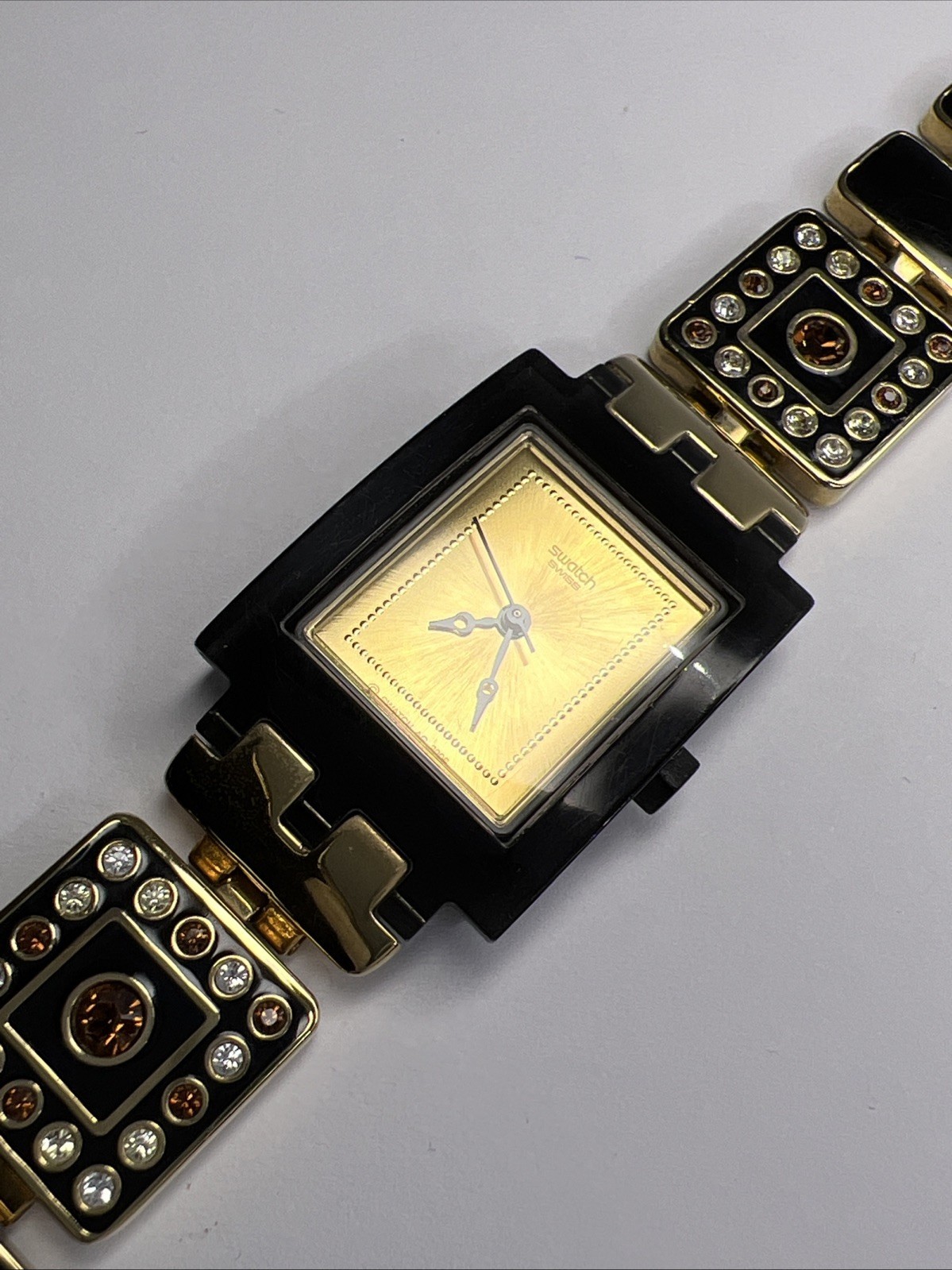 Swatch Square Watch SUBM104G AG2006 Luxotric Gold Tone & Black Quartz Watch