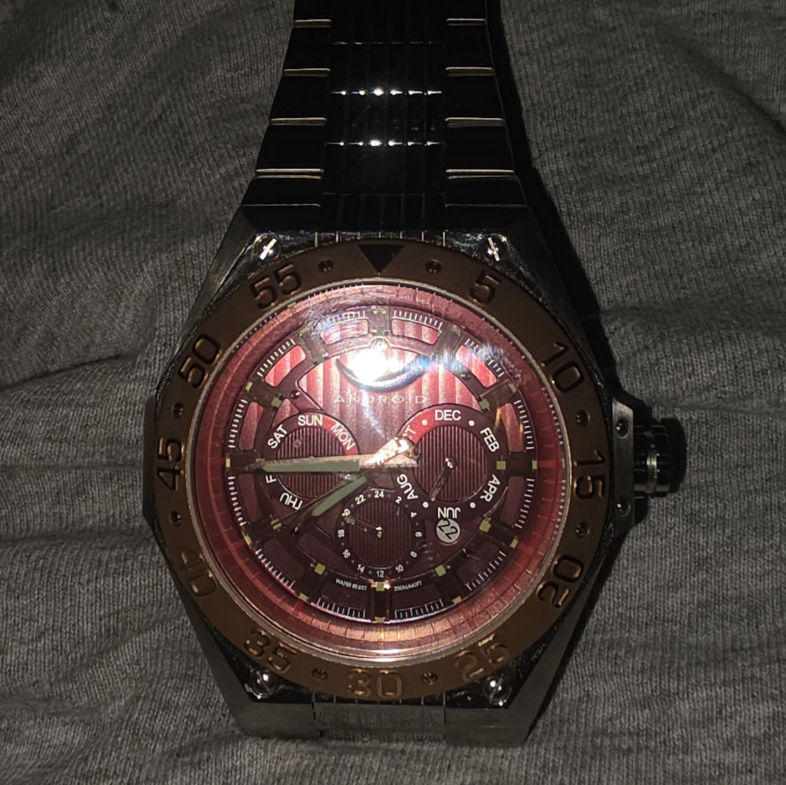 Android Men’s Automatic Analog Wristwatch Red Dial Gold Bezel Date Exhibition