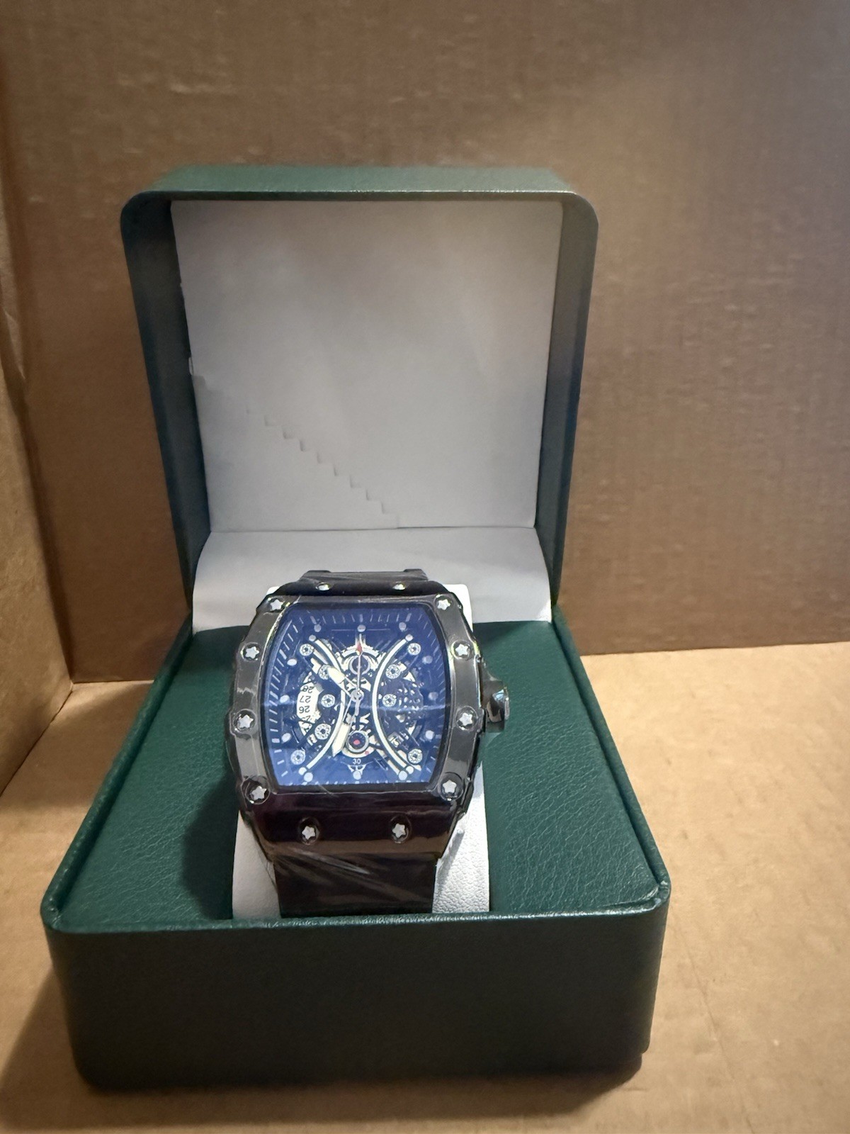 Men’s Tonneau Skeleton Dial Analog Watch Blue Dial Black Rubber Strap Date Box