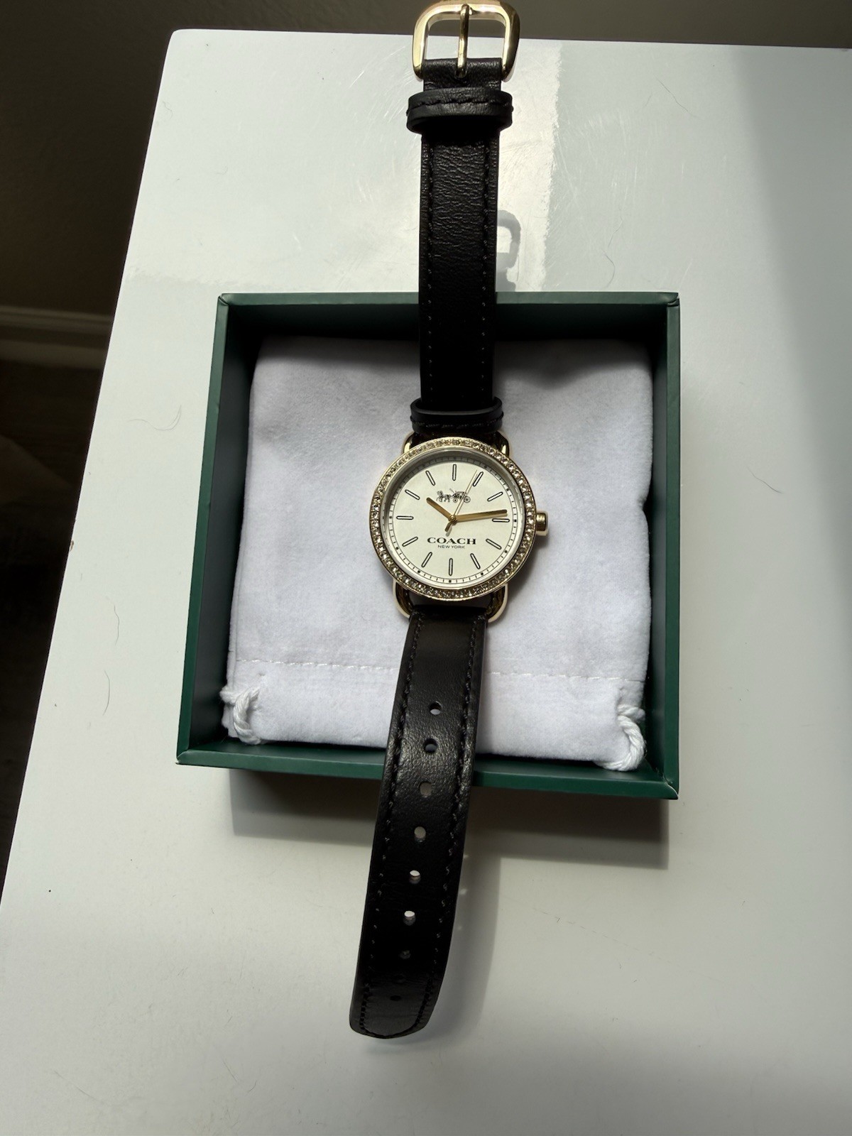 Coach Lex Women’s 28mm Quartz White Dial Gold Tone Crystal Bezel Black Leather