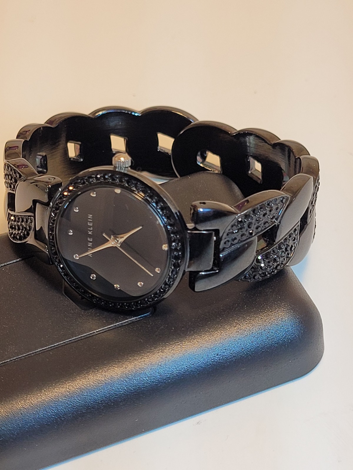 Anne Klein Women’s Black Stainless Bracelet Quartz Analog Watch Gem-Set Bezel