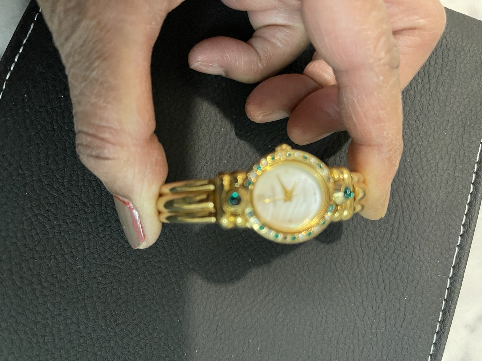 Gold-Tone Gem-Set Bangle Wristwatch with Green Stones & White Dial Analog
