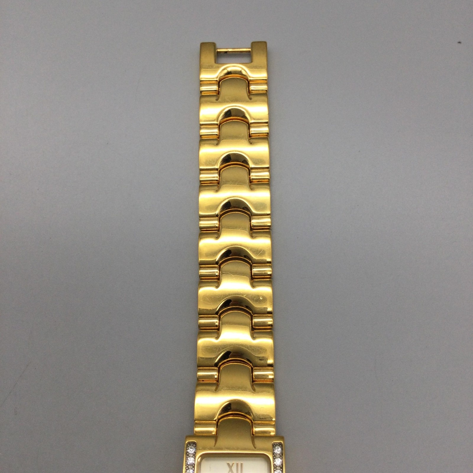 Caravelle By Bulova Womens Watch 17mm Gold Tone Tank Diamond New Battery 6″