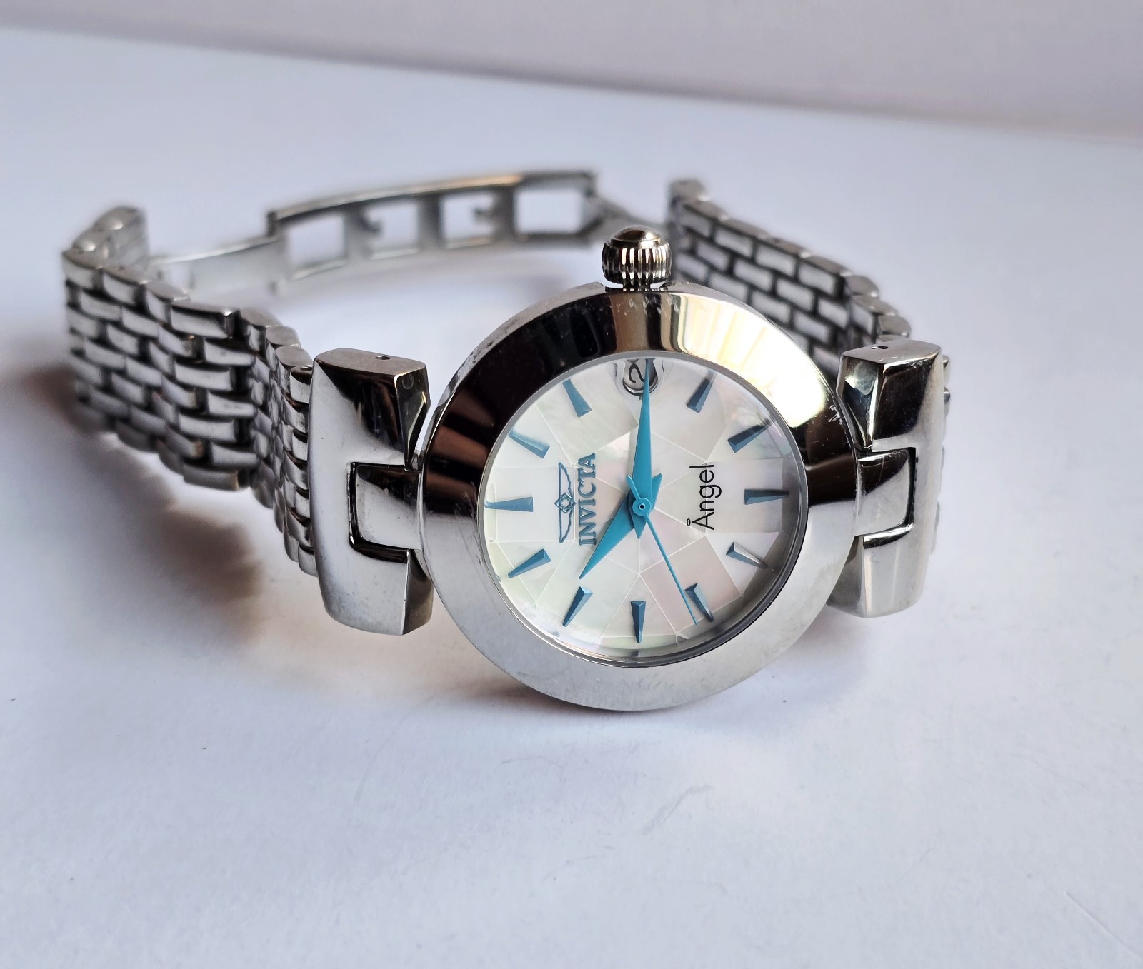 Invicta Angel Watch 15869 Mosaic Face, Silver Color, Blue Hands & Indices Runs
